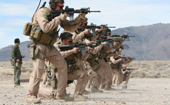 Marines and Sailors with a company from 2d Marine Special Operations Battalion, U.S. Marine Corps Forces, Special Operations Command sight in on their targets as they conduct shooting drills as part of their Dynamic Assault package at the Washoe County Regional Shooting Facility here, April 7.