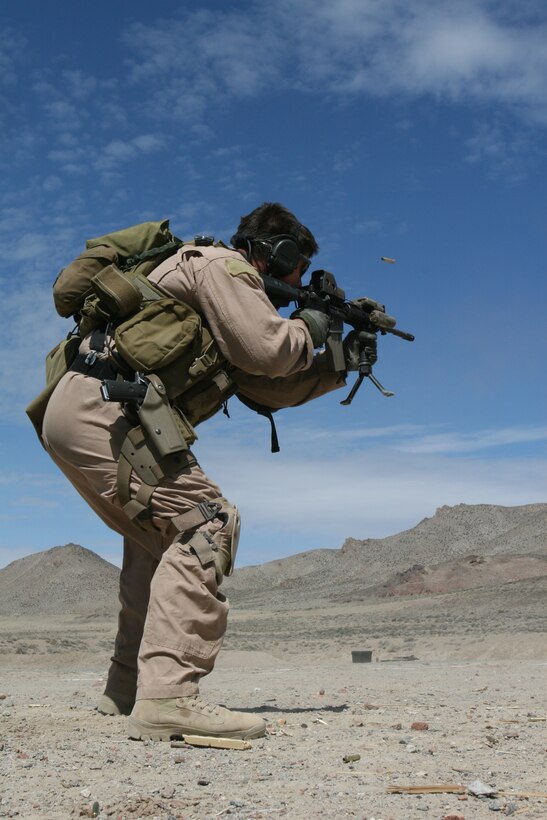 A Marine with a company from 2nd Marine Special Operations Battalion, U.S. Marine Corps Forces, Special Operations Command fires on his target while he conducts shooting drills as part of the Dynamic Assault package at the Washoe County Regional Shooting Facility here, April 7.