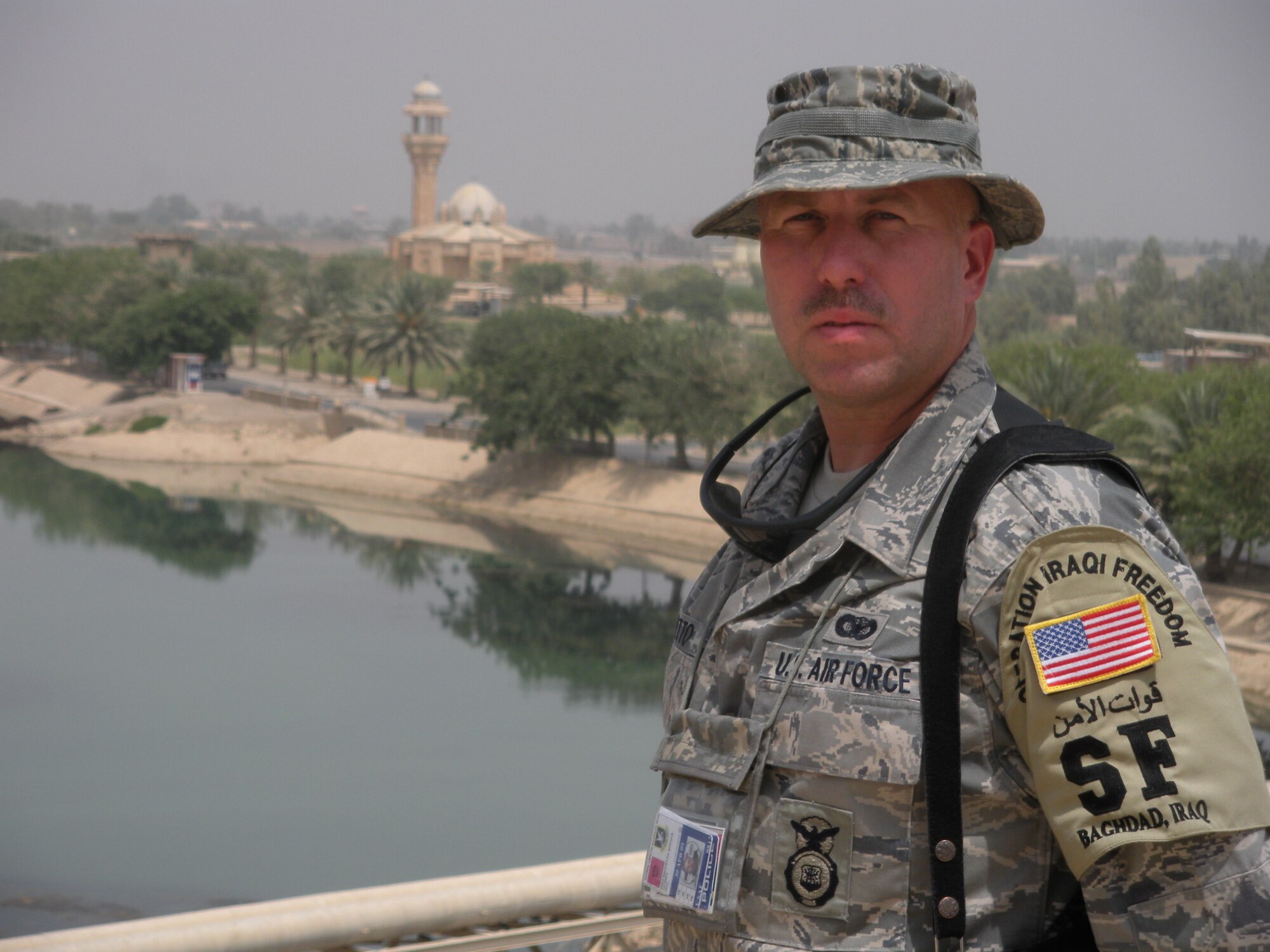 Staff Sgt. Ronald “The Toe” Brovetto stands in front of one of Saddam Hussein’s palaces in Al Faw, Iraq. (U.S. Air Force photo by Staff Sgt. Andrew Musselman)