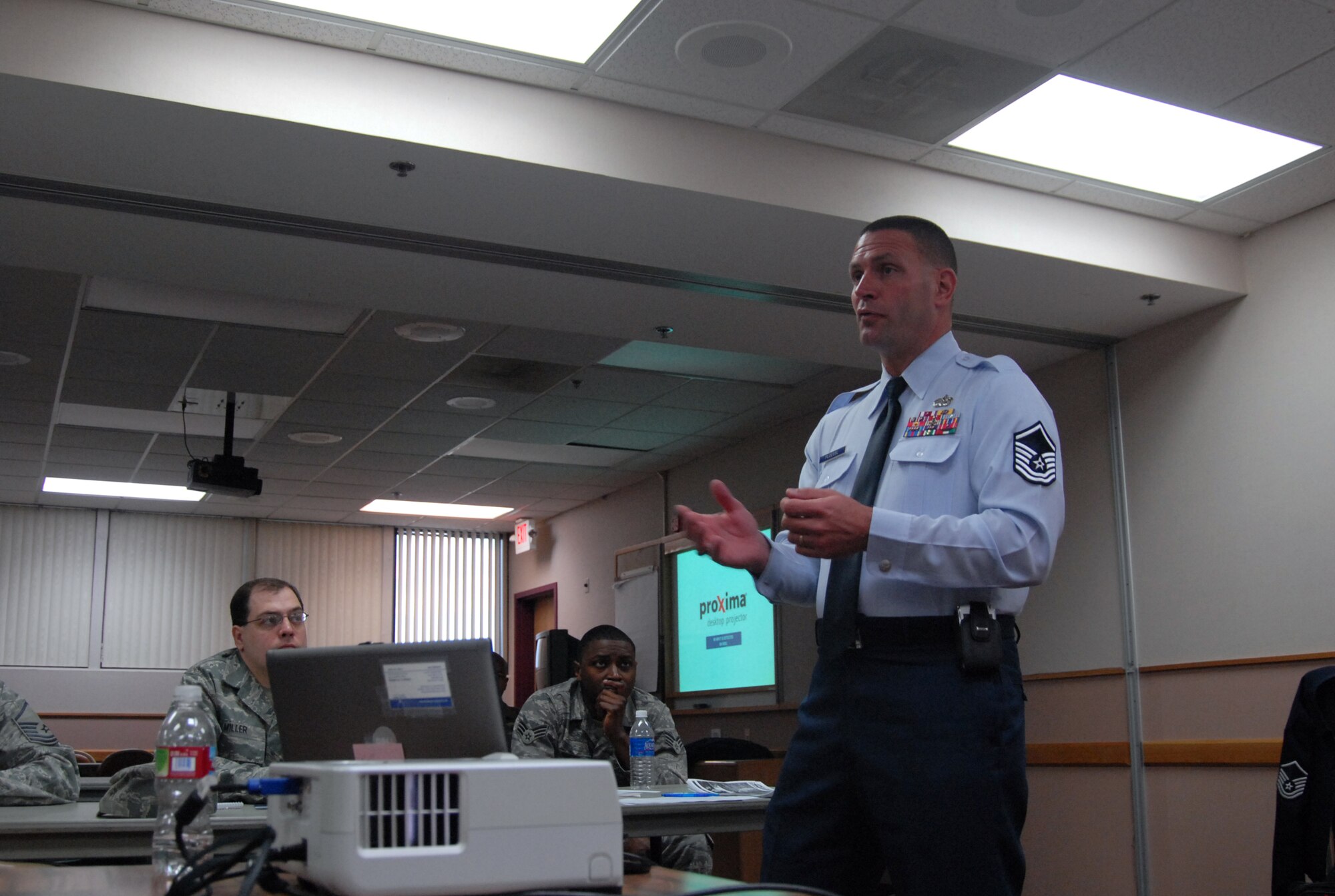 Master Sgt. Craig Ploessl, superintendent of the Air Force Recruiter Screening Team, talks to Edwards Airmen at the Oasis Community Center April 8 about special-duty assignments.The Air Education and Training Command Special-Duty Assignment Team arrived at Edwards April 8 to showcase the mission and benefits of special-duty assignments, and encourage Airmen to apply. (U.S. Air Force photo/Senior Airman Julius Delos Reyes)