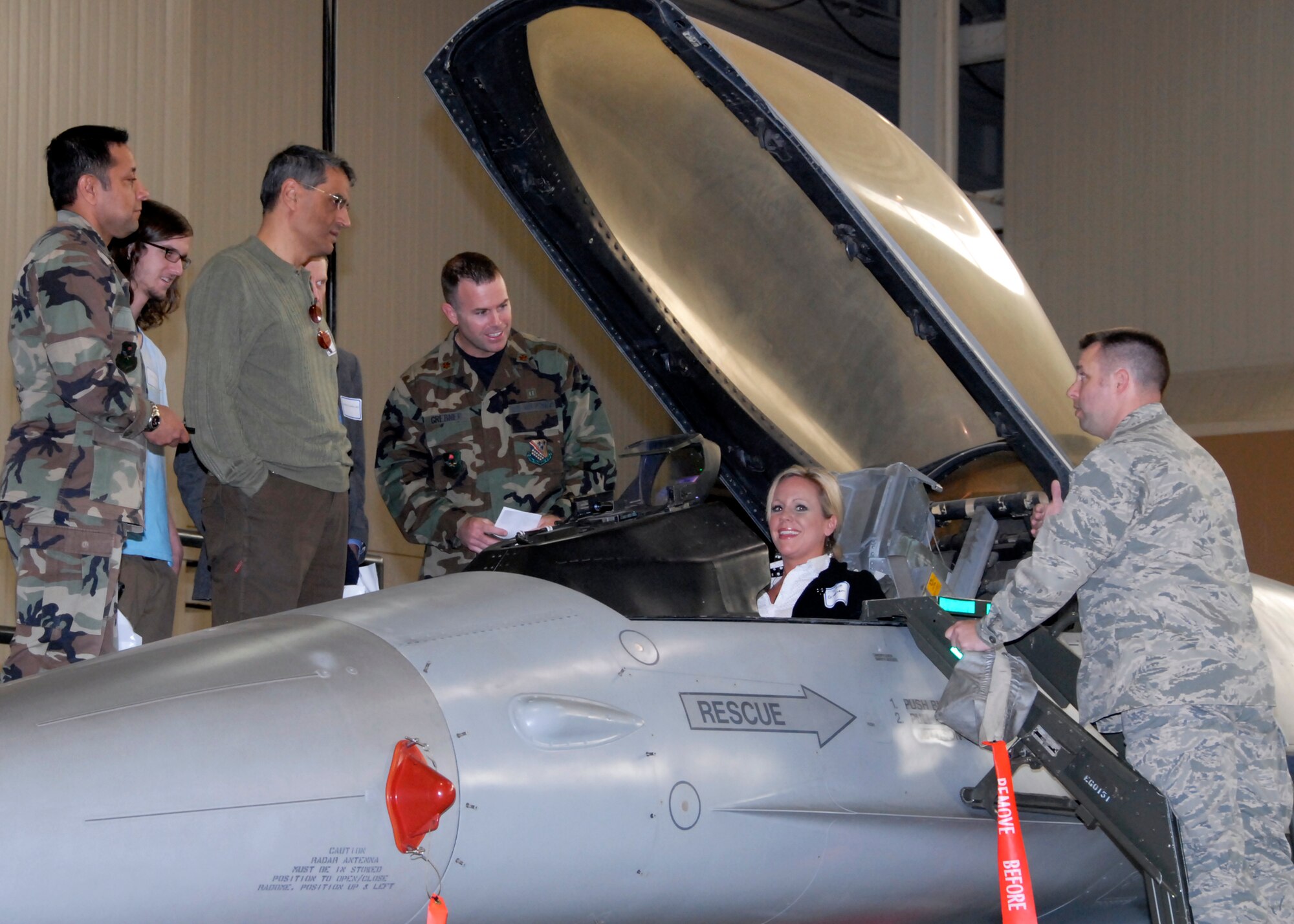 Capt. Michael Spaulding, director of operations in the 363rd Training Squadron, shows Marcie Grebner, a United Regional representative, the controls in the trainer cockpit at the 82nd Medical Group Provider Open House. The open house provided an opportunity for Sheppard's medical civiliancounterparts to understand Sheppard's mission and network. (U.S. Air Force photo/Mike Litteken)

