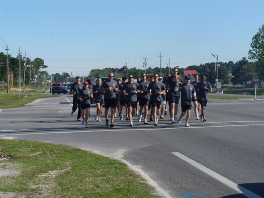 More than 40 members from the 325th Security Forces Squadron, Panama City Police and Bay County Sheriff’s Department participated in the 2009 Law Enforcement Torch Run in Panama City April 6.  The Torch Run helps raise awareness for the Special Olympics.  (Courtesy photo)