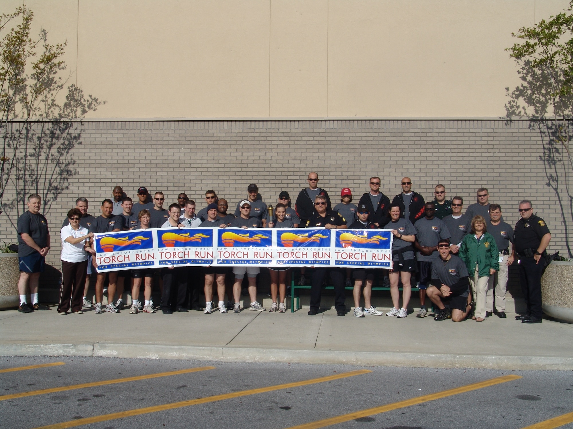 More than 40 members from the 325th Security Forces Squadron, Panama City Police and Bay County Sheriff’s Department participated in the 2009 Law Enforcement Torch Run in Panama City April 6.  The Torch Run helps raise awareness for the Special Olympics.  (Courtesy photo)