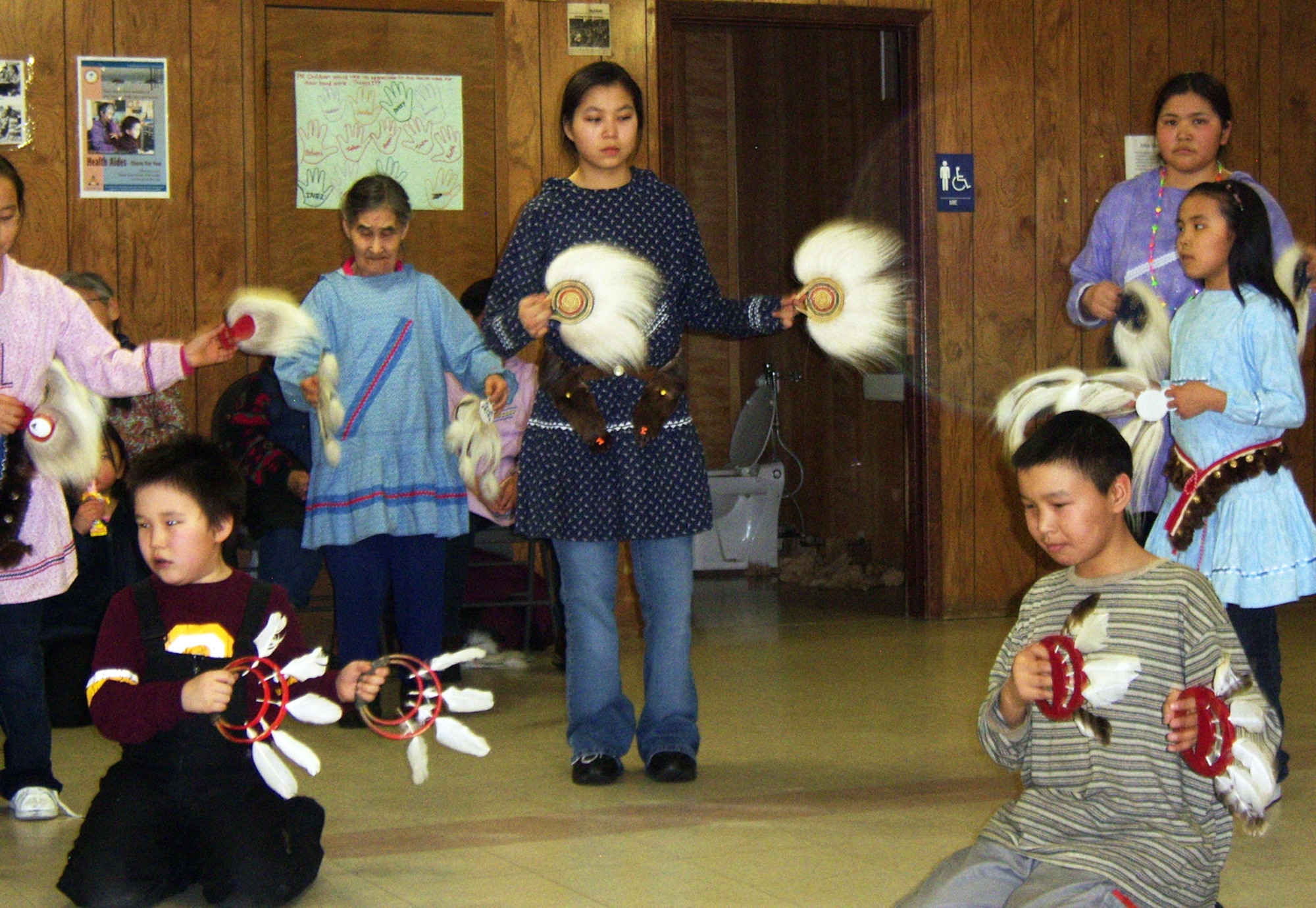 Lt. Col. Cheryl Hooper said she felt immersed in the culture of Alaknuk, Alaska, a small village she and a team of other military medical personnel were sent to in support of Operation Arctic Care. The annual exercise provides health care to underserved residents of rural Alaska. Native dancing (seen here) is part of the Alakanuk heritage that villagers want to preserve. (Courtesy photo)