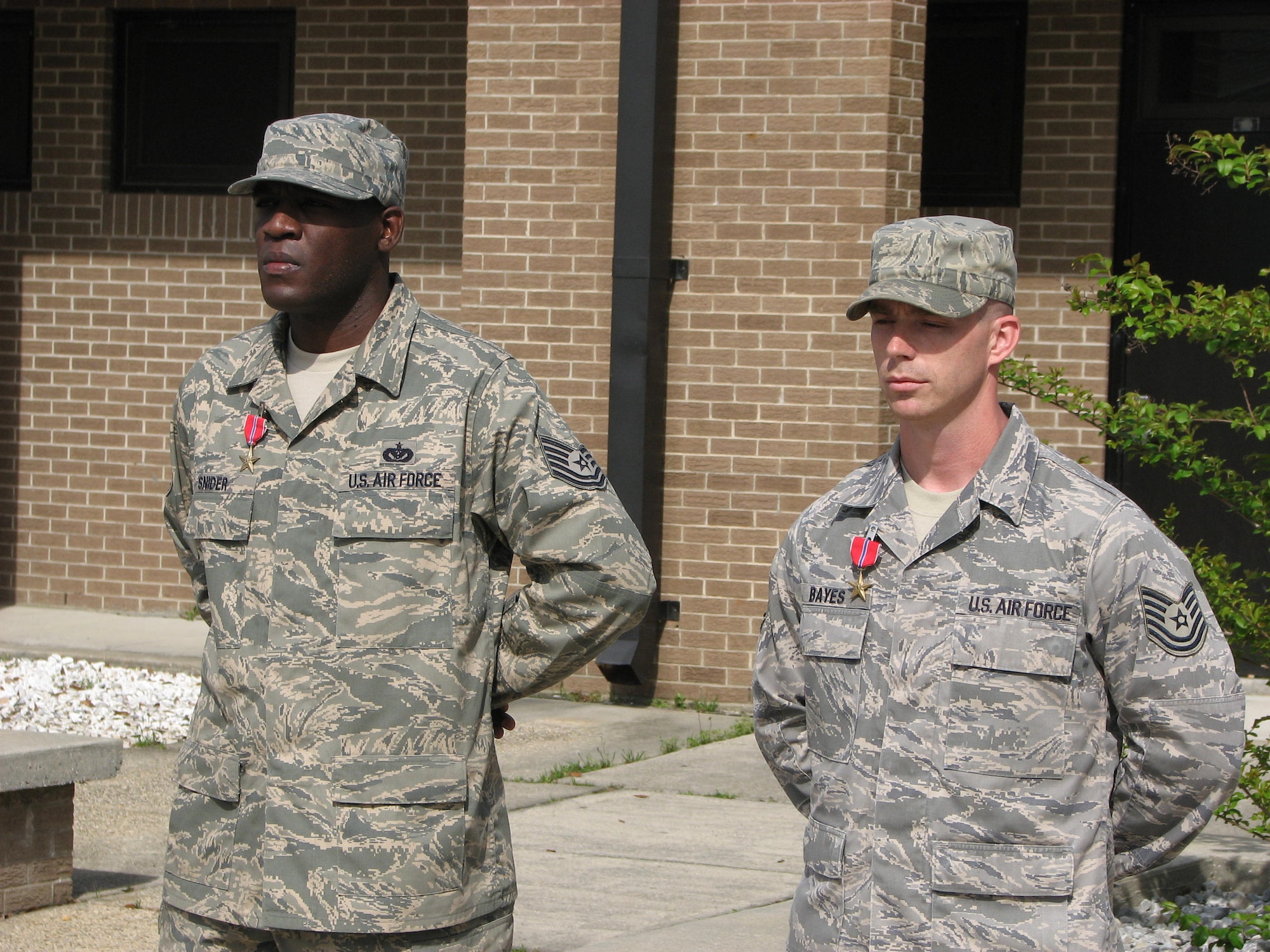 Tech. Sgts. Wendell Snider and Timothy Bayes  were recognized for exceptionally meritorious service in support of Operation Enduring Freedom in 2008.  They are serving at Detachment 6, 366th Training Squadron at Naval Construction Training Center in Gulfport, Miss. (U.S. photo/ Petty Officer Second Class Corey Self)