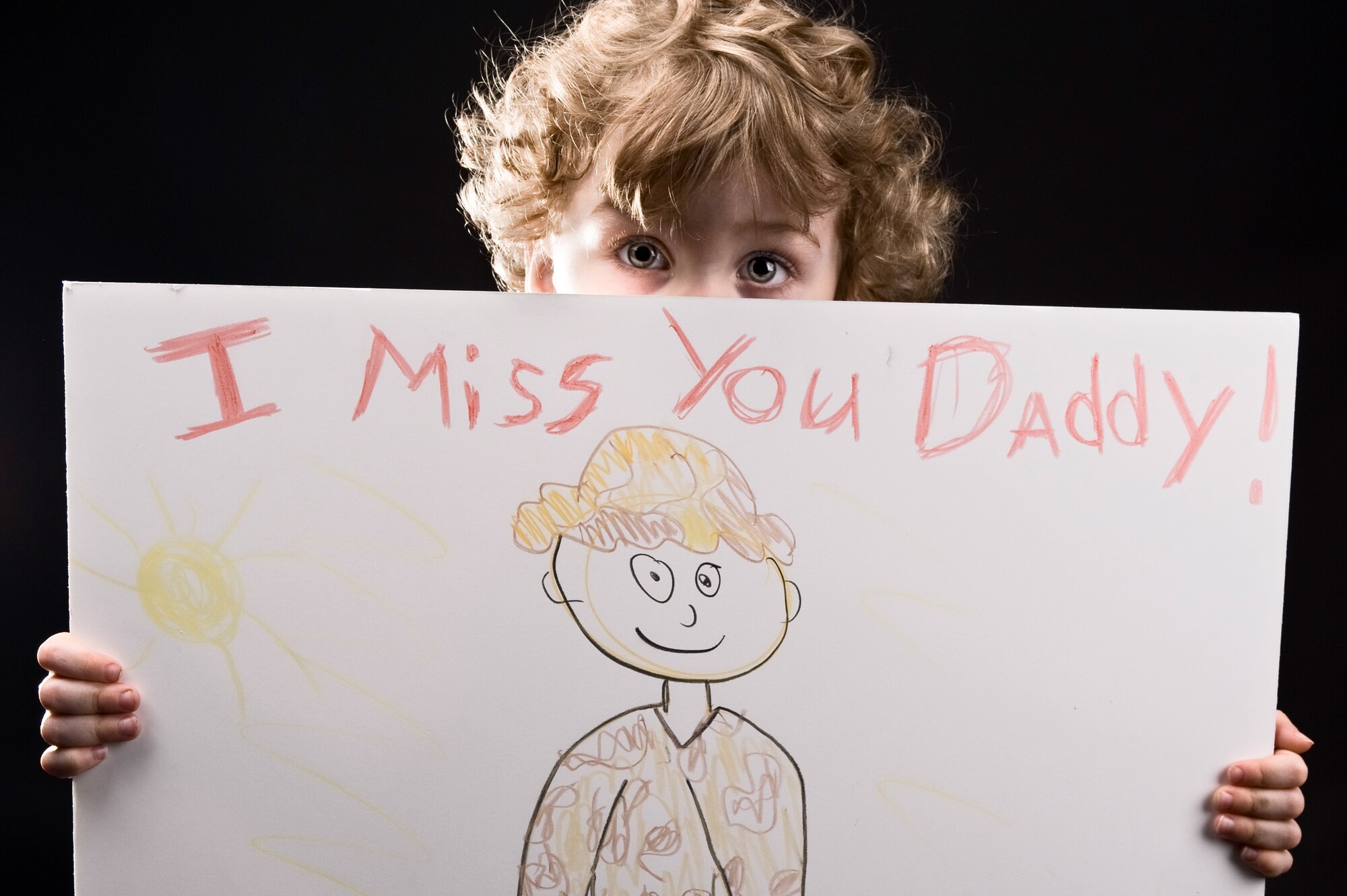 The month of April is designated as Month of the Military Child to recognize the sacrifices armed forces children make and the hardships they must overcome being separated while a parent is deployed supporting Overseas Contingency Operations.  (U.S. Air Force photo/Senior Airman Jonathan Snyder)