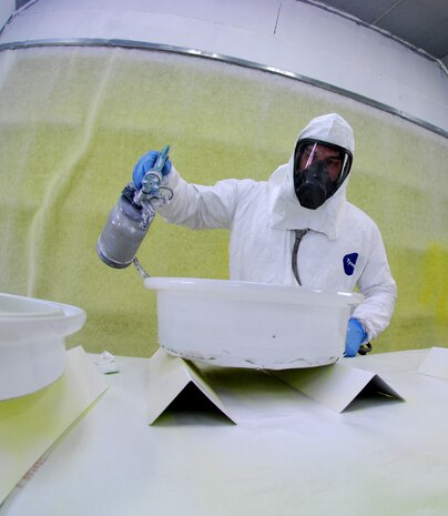 Staff Sgt. Martin Roberts, 9th Maintenance Squadron NCO in charge of corrosion control, puts the first coat of paint on a set of wheels for the U-2 Dragon Lady April 8, at the fabrication shop. Corrosion control is an integral part of keeping aircraft mission ready. (Photo by Airman 1st Class David Tracy)