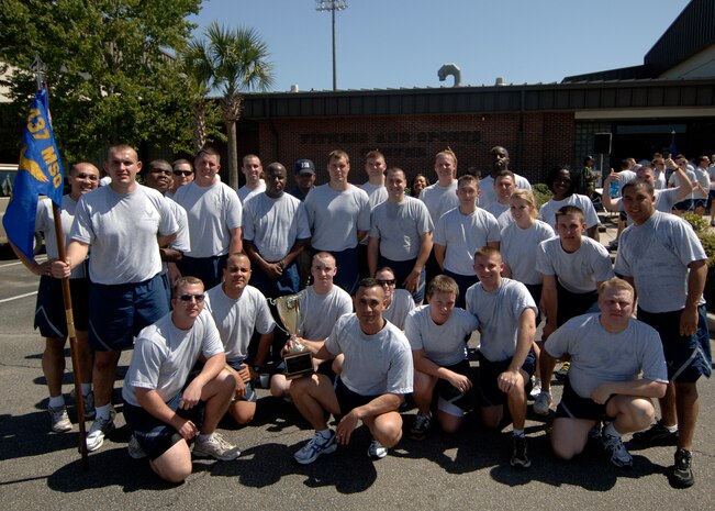The 437th Communications Squadron was the first to finish the 5k Commander's Fitness Challenge on Charleston AFB April 3. The communication squadron received the spirit trophy for exhibiting the most spirit during the 5K fitness run. (U.S. Air Force photo/Senior Airman Timothy Taylor)