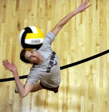 First Lt. Haley Homan, 28th Operations Support Squadron Weather Flight deputy commander, practices her serve during a during her daily volleyball practice at the Bellamy Fitness Center here, April 7. Lieutenant Homan is preparing for the upcoming 2009 All-Air Force Women's Volleyball Team tryout camp at Hill AFB, Utah, May 16. (U.S. Air Force photo/Airman 1st Class Abigail Klein)