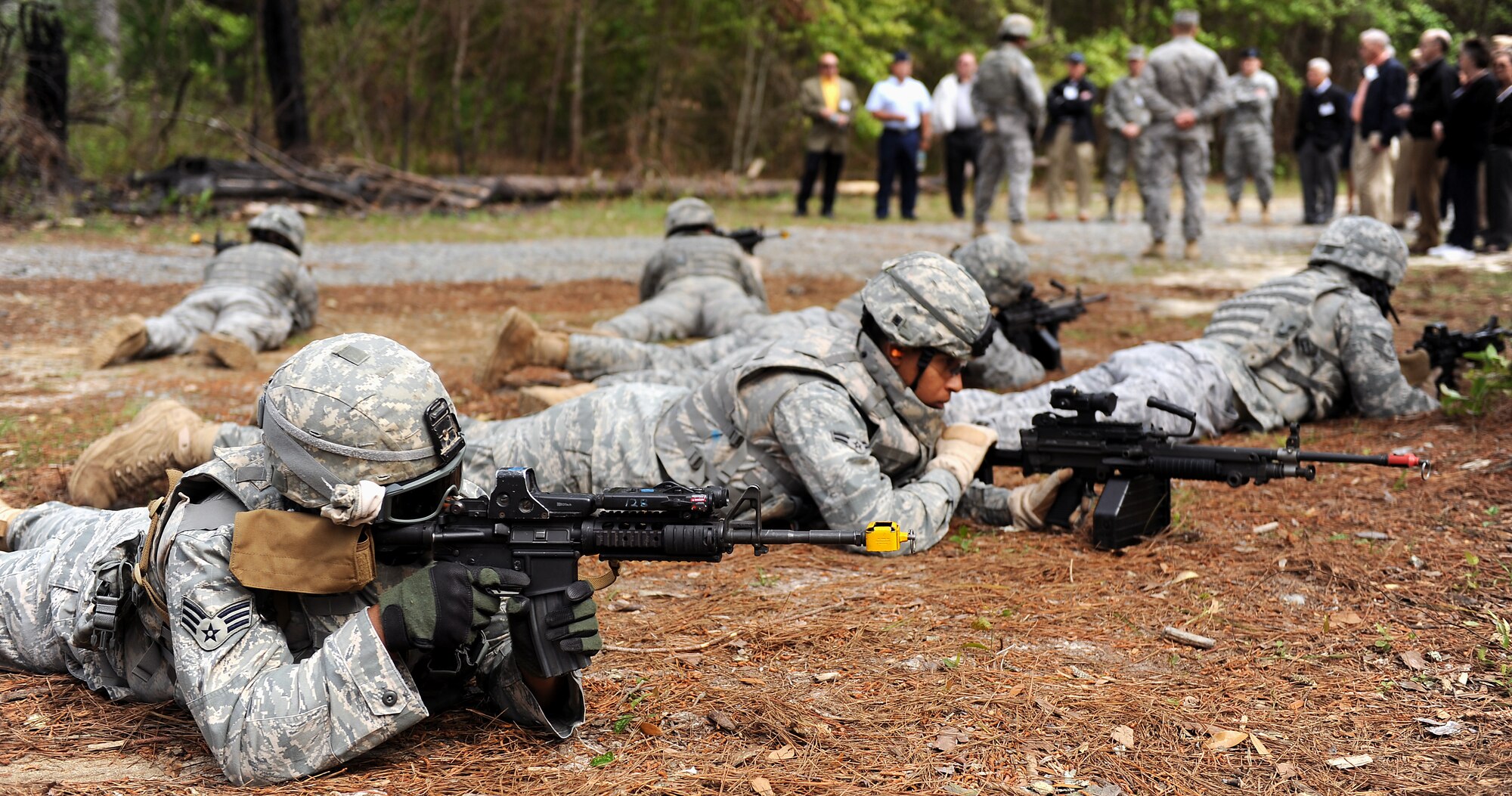MOODY AIR FORCE BASE, Ga. -- The Georgia Military Affairs Coordinating
Committee watches a combat exercise scenerio at the military operations in urban terrain training village during a base tour here April 6. The GMACC members were able to witness a scenario Airmen may experience during a wartime combat event. (U.S. Air Force photo by Airman Joshua Green) 
