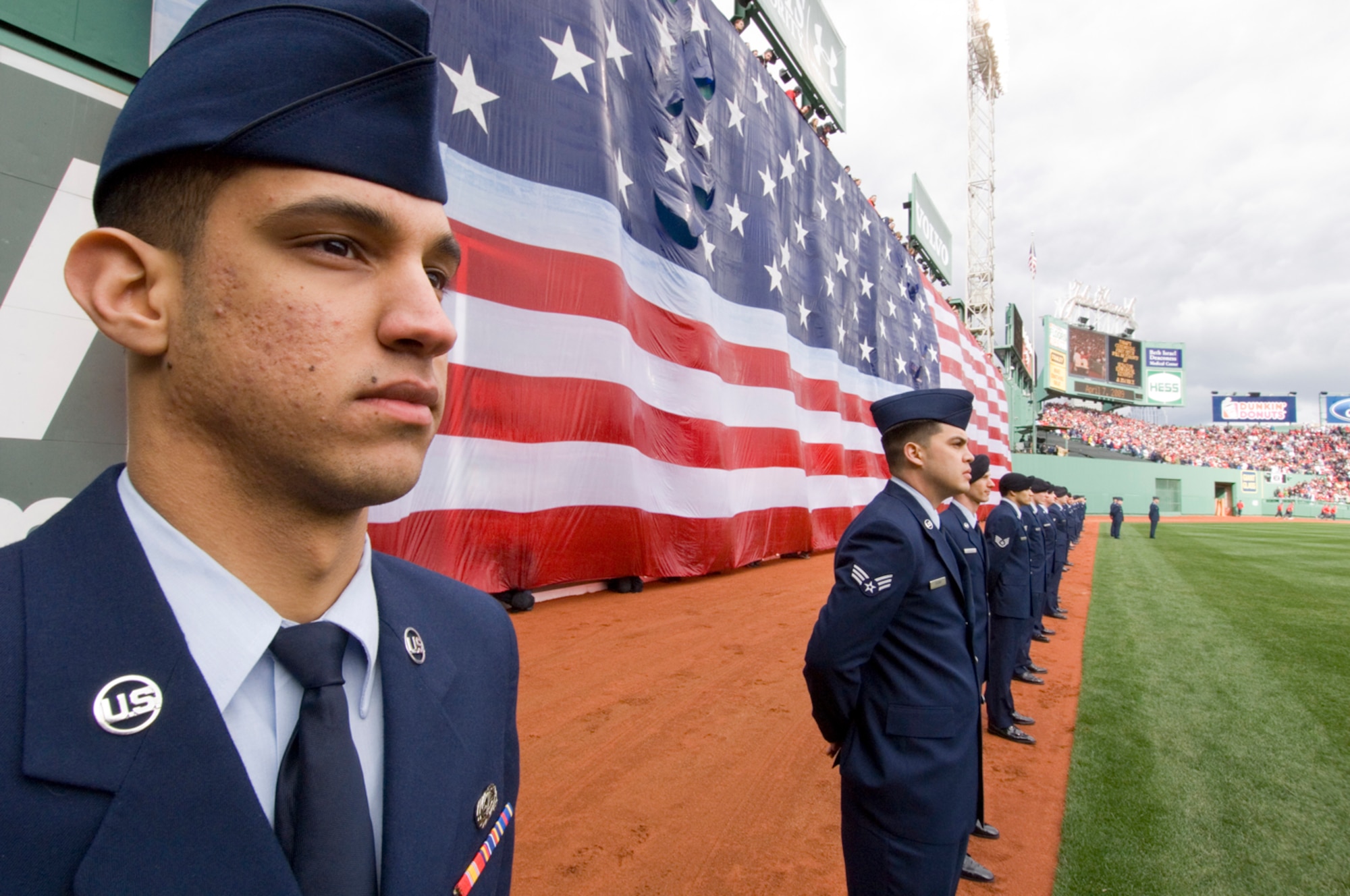 HANSCOM AIR FORCE BASE, Mass. –Airman First Class Eury Marte, 66th Mission Support Group, takes part in the Boston Red Sox opening day ceremonies along with other Hanscom Airmen on April 7 at Fenway Park in Boston, Mass. (U.S. Air Force photo by Mark Wyatt) 