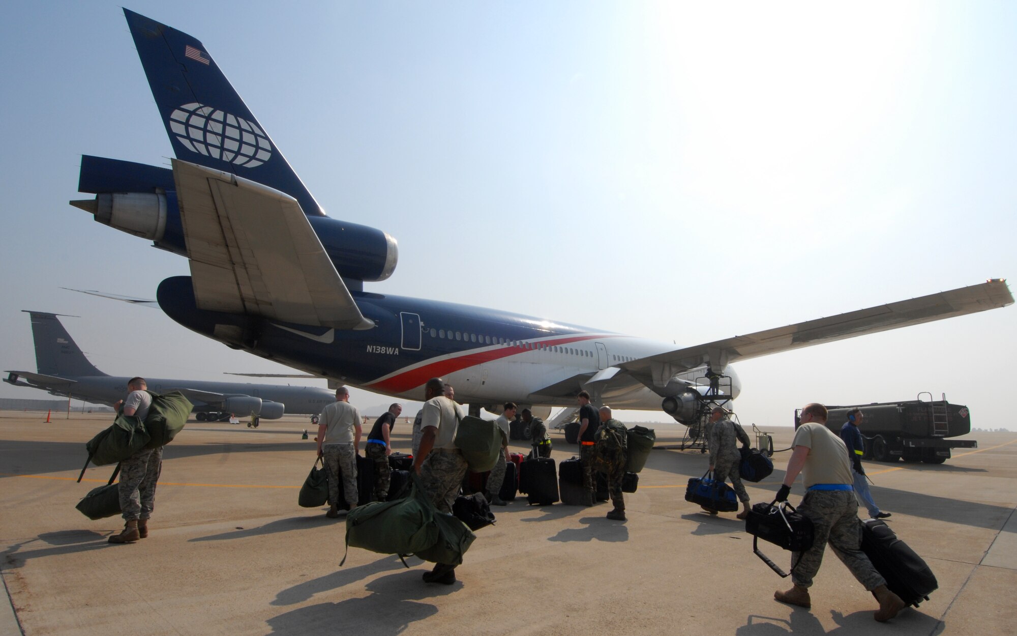 Wolf Pack maintainers assigned to the 8th Aicraft Maintenence Squadron load baggage before deployingfrom Kunsan Air Base, Republic of Korea to Eielson Air Force Base, Alaska for Red Flag-Alaska April 7. Red Flag-Alaska is a realistic, 10-day air-combat training exercise. (U.S. Air Force Photo/Senior Airman Gustavo Gonzalez)