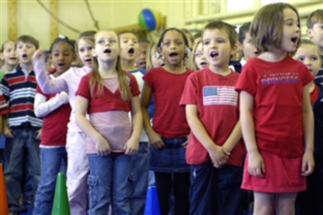 Butner Elementary School students sing patriotic music during a ceremony to celebrate the Month of the Military Child on Fort Bragg, N.C., April 2, 2009. The Month of the Military Child takes place during April.