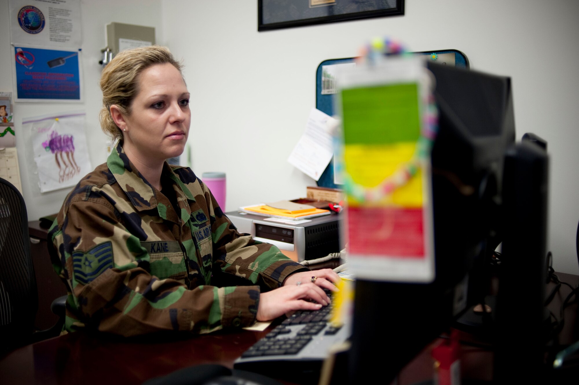 MISAWA AIR BASE, Japan -- Tech. Sgt. Cheryl Kane, 35th Fighter Wing knowledge operations section chief, works at her desk April 10, 2009. Sergeant Kane was named the 2008 Air Force Communications and Information Outstanding Information Management (AFSC 3AXXX) Noncommissioned Officer of the Year. (U.S. Air Force photo by Staff Sgt. Samuel Morse)