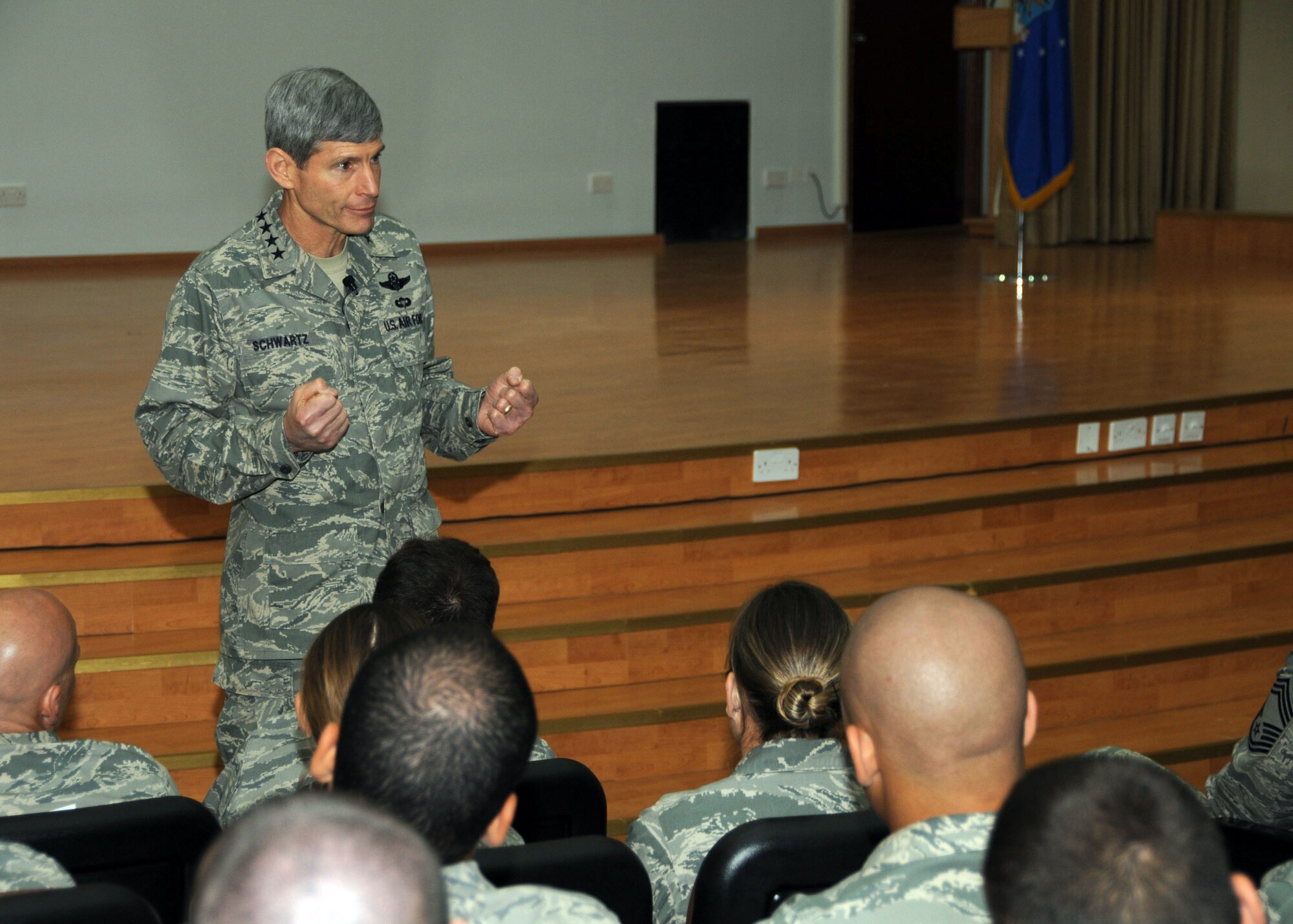 Air Force Chief of Staff Gen. Norton Schwartz talks about their mission and the current changes in the Air Force to the Airmen of the 386th Air Expeditionary Wing April 6 at an air base in Southwest Asia.  General Schwartz, accompanied by his wife, is visiting Airmen throughout the area of responsibility, to inform them and answer questions they might have about changes in the Air Force. (U.S. Air Force photo/ Senior Airman Courtney Richardson) 