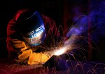 Staff Sgt. Nicole Lomax uses a metal inert gas welding machine to weld a T-joint for her skill level upgrade at Lackland Air Force Base, Texas. Sergeant Lomax is assigned to the Air Force Reserve Command's 433rd Airlift Wing at Lackland.  (U.S. Air Force photo/Robbin Cresswell)