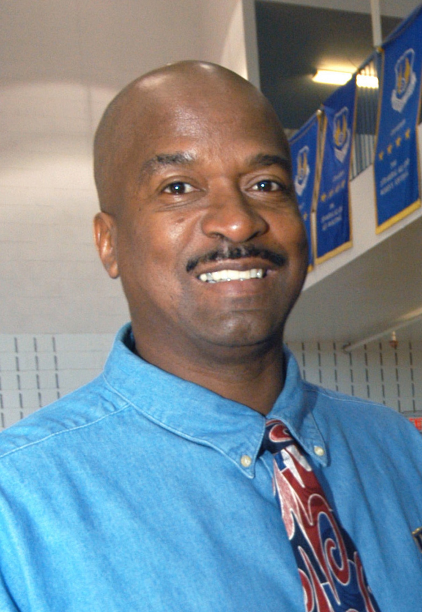John Bailey an item manager for the  C-17 Product Directorate will coach the Air Force men's basketball team for the fifth straight season. U. S. Air Force photo by Sue Sapp  U. S. Air Force photo by Sue Sapp       