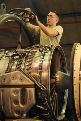 Senior Airman Isaiah Smith, 4th Component Maintenance Squadron, aligns an engine during a test in the hush house at Seymour Johnson Air Force Base, N.C., April 6, 2009. Engines are tested in the hush house when brand new and after repairs. (U.S. Air Force photo by Airman 1st Class Whitney S. Lambert)