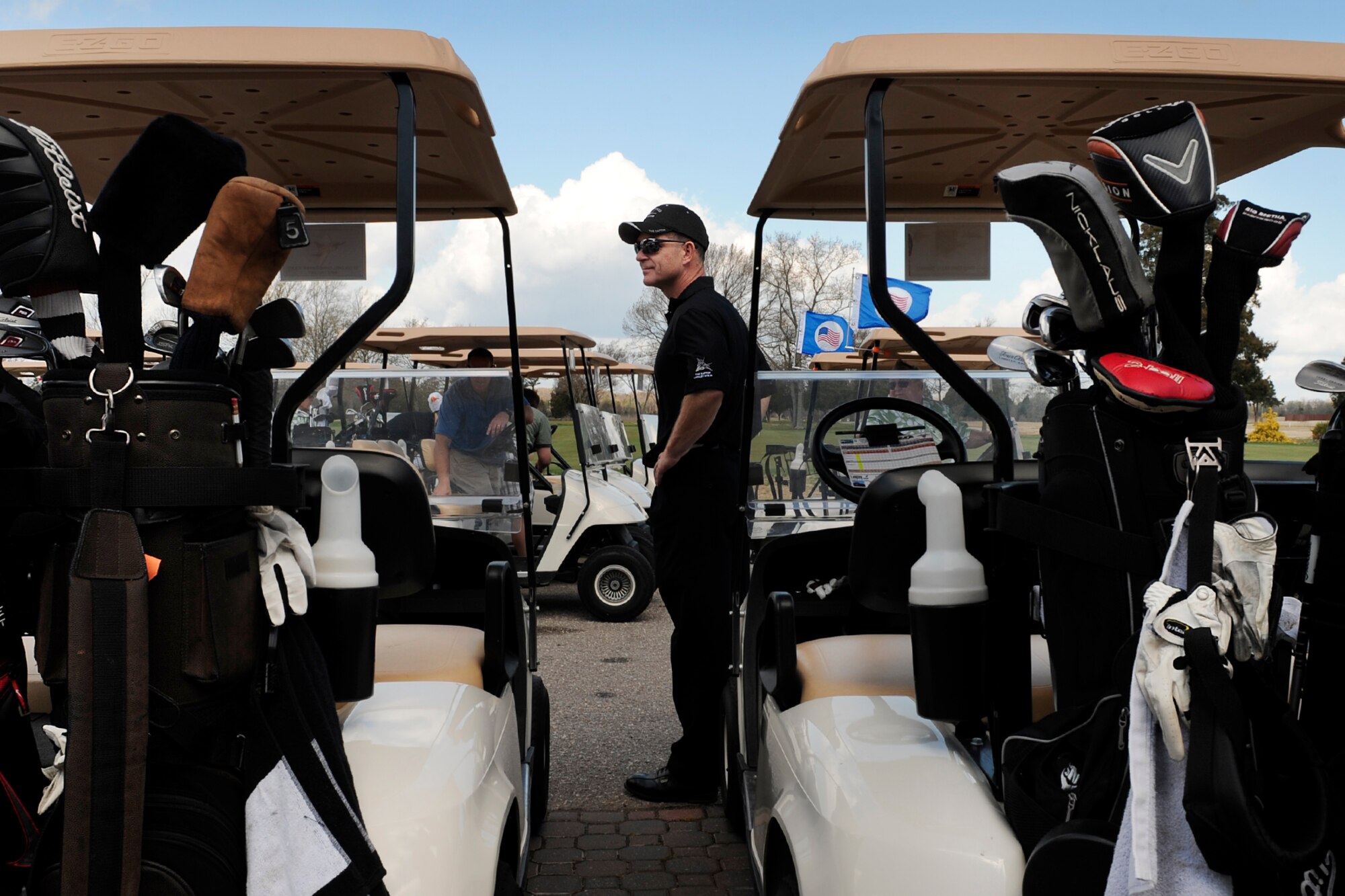 LANGLEY AIR FORCE BASE, Va. --  Brig. Gen. Mark A. Barrett, 1st Fighter Wing commander, waits for participants to gather for his Invitational Golf Tournament here April 3.  More than 70 Airmen and civic leaders were invited by the commander to play in the 18 hole golf tournament.  (U.S. Air Force photo/Senior Airman Vernon Young)