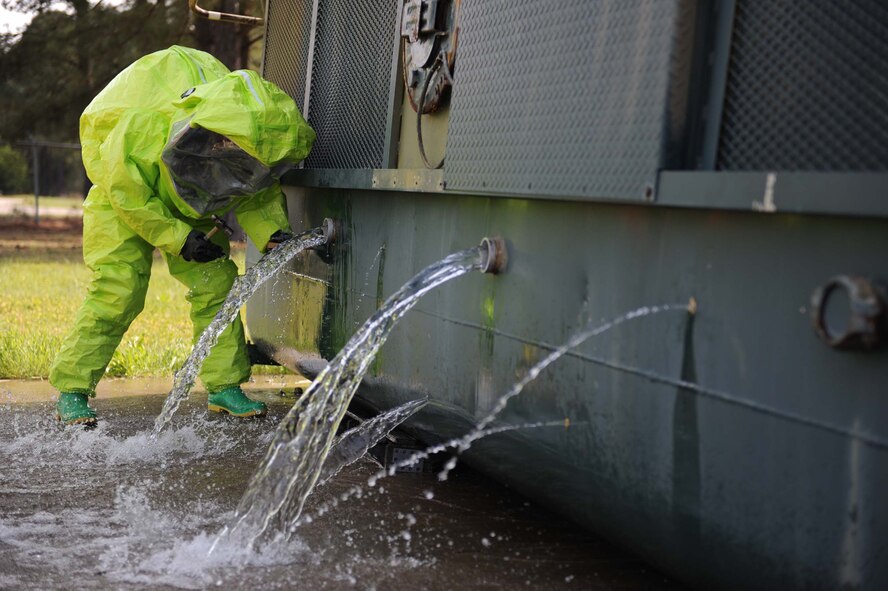SHAW AIR FORCE BASE, S.C. -- A 20th Civil Engineer Squadron firefighter engages a simulated radioactive attack during a hazardous materails exercise April 9, 2009. The HAZMAT exercises help prepare Airman in the 20th Aeromedical-Dental Squadron and 20th CES to properly respond to real-world operations. (U.S. Air Force photo/ Senior Airman Matt Davis) 

