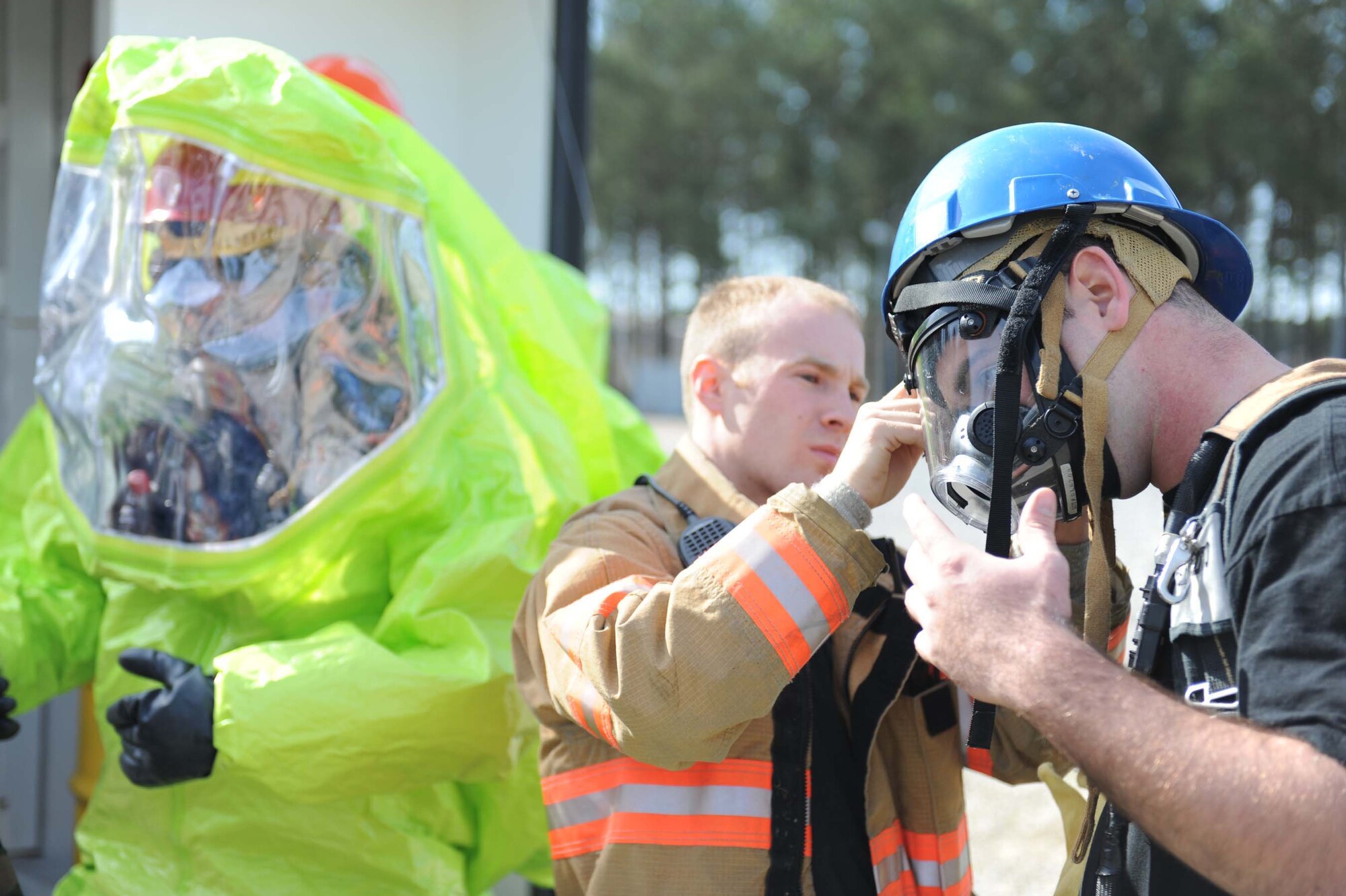 SHAW AIR FORCE BASE, S.C. -- Airman 1st Class Thomas Cirba helps Airman 1st Class Sean Gantzer prepare his Level-A HAZMAT Suit to engage a simulated radioactive attack during a hazardous materails exercise April 9, 2009. The HAZMAT exercises help prepare Airman in 20th Aeromedical-Dental Squadron and 20th Civil Engineer Squadron to properly respond to real world operations. (U.S. Air Force photo/Senior Airman Matt Davis)