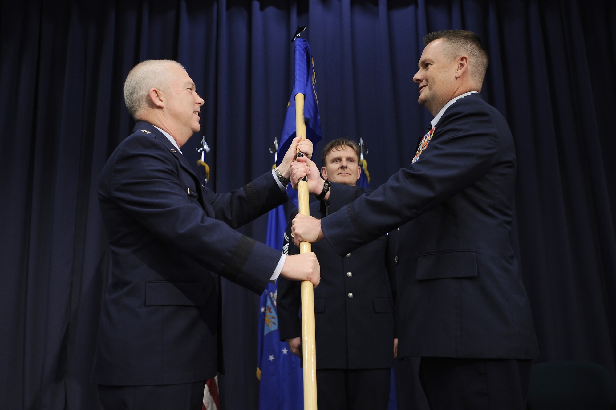 HURLBURT FIELD, Fla. ? Lt. Gen. Donald Wurster, Commander Air Force Special Operations Command, presents the 23rd Air Force guidon to Col. Marshall Webb during a change of command ceremony April 3. Colonel Webb assumed command from Brig. Gen Richard Haddad. (U.S. Air Force photo/ SrA Jason Epley)(Released)