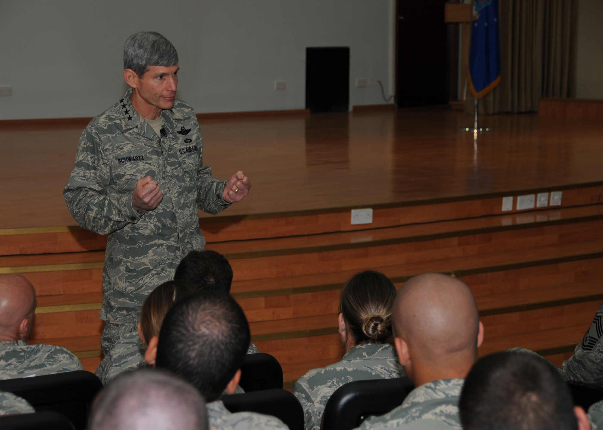 SOUTHWEST ASIA -- Air Force Chief of Staff Gen. Norton Schwartz talks to the Airmen of the 386th Air Expeditionary Wing about their mission and the current changes in the Air Force at an air base in Southwest Asia, April 6. General Schwartz, accompanied by his wife, is visiting Airmen throughout the Area of Responsibility, to inform and answer questions they might have about changes in the Air Force.  (U.S. Air Force photo/ Senior Airman Courtney Richardson)