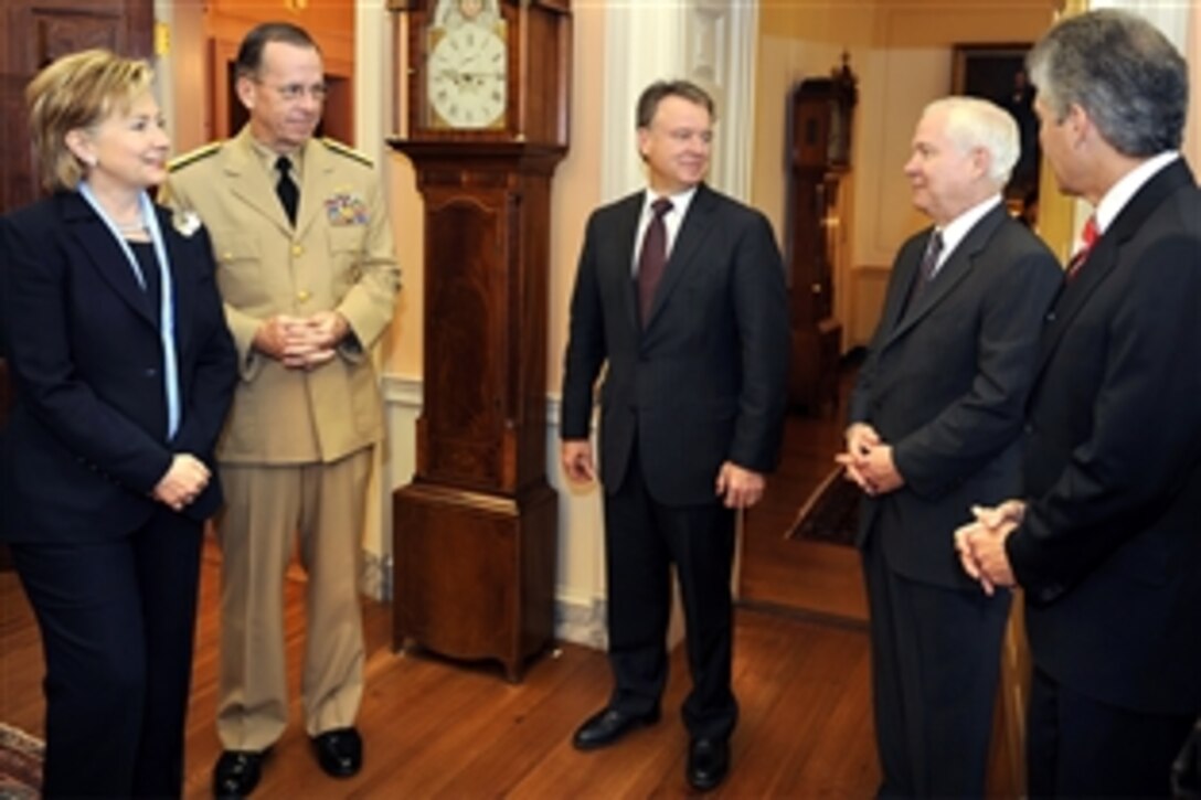 Left to right: U.S. Secretary of State Hillary Clinton talks with U.S. Navy Adm. Mike Mullen, chairman of the Joint Chiefs of Staff, Australian Defense Minister Joel Fitzgibbon, U.S. Defense Secretary Robert M. Gates and Australian Minister for Foreign Affairs Stephen Smith at the U.S. State Department during the Australian Ministerial, April 9, 2009. 
