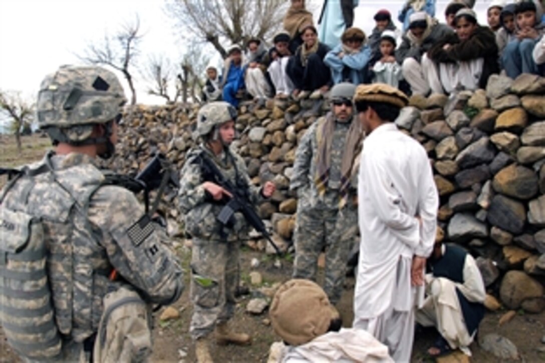 U.S. Army soldiers talk with village leaders in Shabow-Kheyl, Afghanistan, April 8, 2009. The soldiers are assigned to Company D, 1st Battalion, 501st Parachute Infantry Regiment.