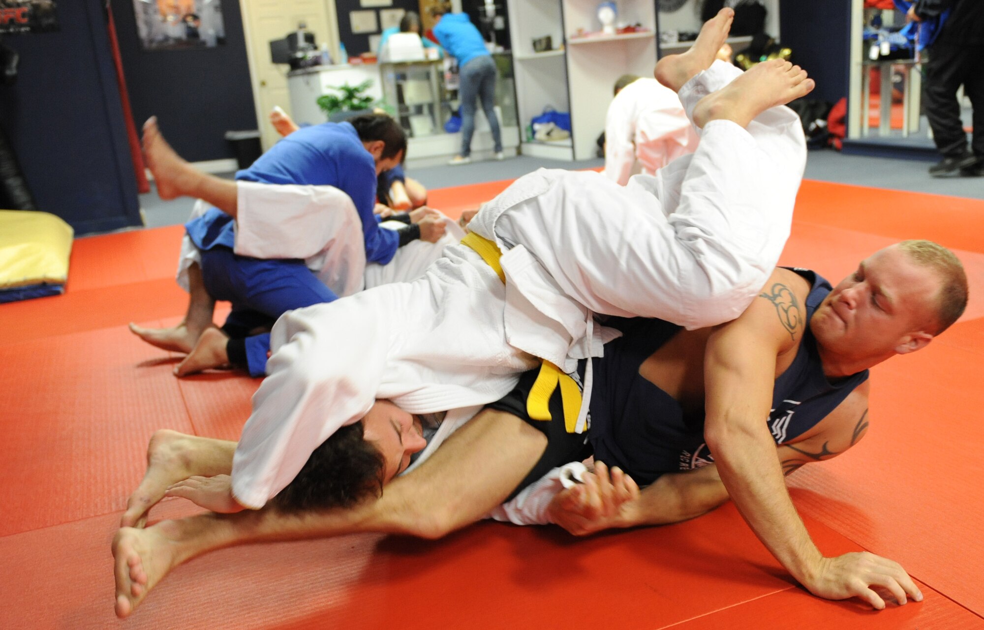 WARRENSBURG, Mo. – David Pearlstone, Warrior JuJitsu student, escapes a crossbody armlock executed by Airman 1st Class Rocky Reed, 509th Security Forces Squadron, April 9. Airman Reed won two gold medals at the 2009 Judo Open and Shingitai Regional at Pleasant Hill, Mo. March 28.  Four Team Whiteman members won trophies at the tournament. (U.S. Air Force photo/Senior Airman Stephen Linch)