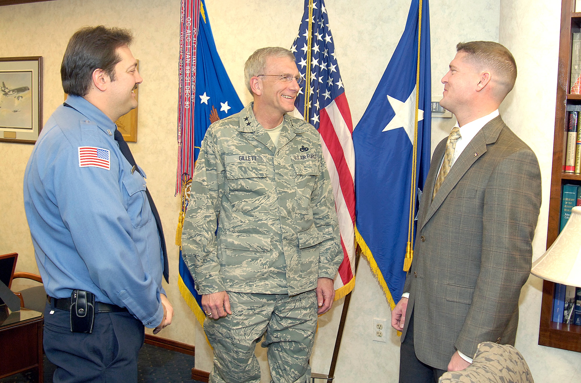 Base union leadership had an orientation meeting with Oklahoma City Air Logistics Center Commander Maj. Gen. P. David Gillett Jr. April 3. Todd Lambert, left, is the president of the International Association of Fire Fighters, Local F-211.  James Schmidt is the president of the American Federation of Government Employees, Local 916.  (Air Force photo/Margo Wright)
