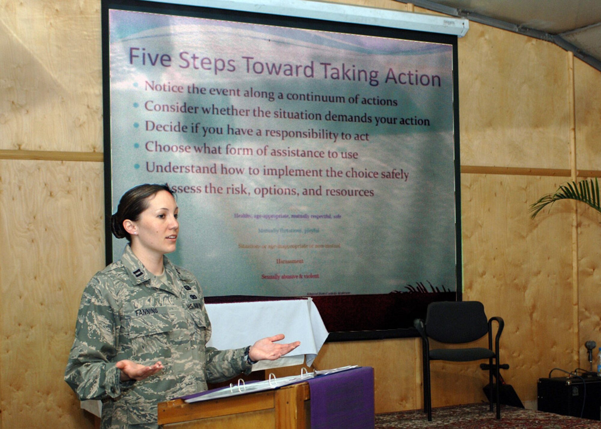 Capt. Jamie Fanning, 376th Air Expeditionary Wing sexual assault response coordinator, speaks at a workshop April 8 for a National Sexual Assault Awareness Month day of action at Manas Air Base, Kyrgyzstan.  The 2009 SAAM focus, "Our strength is for defending," highlights the fact that military missions not only involve national defense, but the defense and safety of the Americans who voluntarily risk their lives in defense for peace. Captain Fanning is deployed from the 52nd Fighter Wing at Spangdahlem AB, Germany, where she also serves as the SARC. (U.S. Air Force photo/Tech. Sgt. Elizabeth Weinberg) 