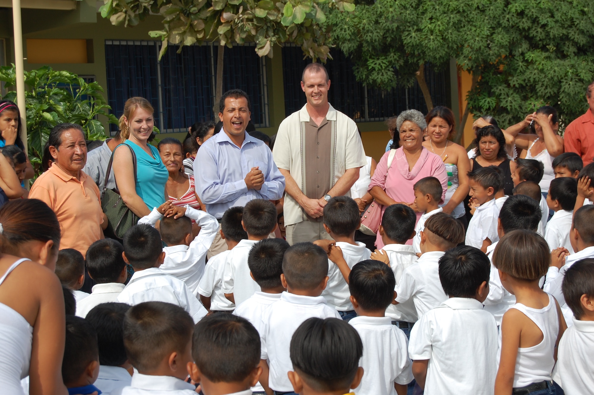 478th EOS Commander, Lt. Col. Jared Curtis, addresses a group of students during a donation delivery to Manta, Ecuador's San Juan Elementary and High Schools April 2. Over 500 children, many of whose families work in the city’s landfill, will benefit from the $5,400-worth of materials donated through U.S. Southern Command’s Humanitarian Assistance Program. (U.S. Air Force photo by 1st Lt. Beth Woodward)
     
