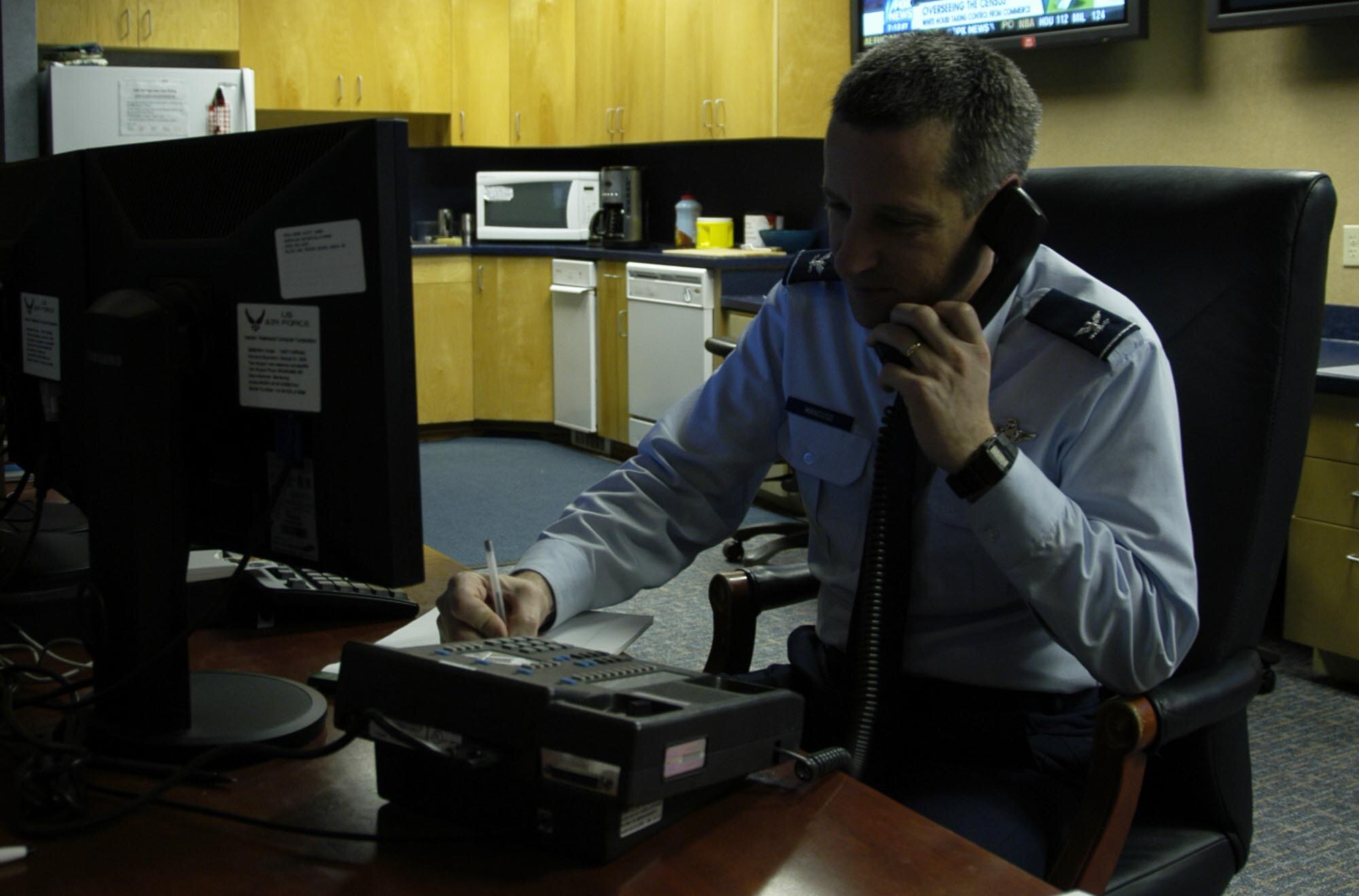 Col. Vince Mancuso monitors air tracks across the Continental U.S. on the operations floor at the 601st Air and Space Operations Center. Col. Mancuso is the mobilization assistant to the operations director at Headquarters U.S. Air Force and recently deployed on an Air Expeditionary Force tour at the AOC.