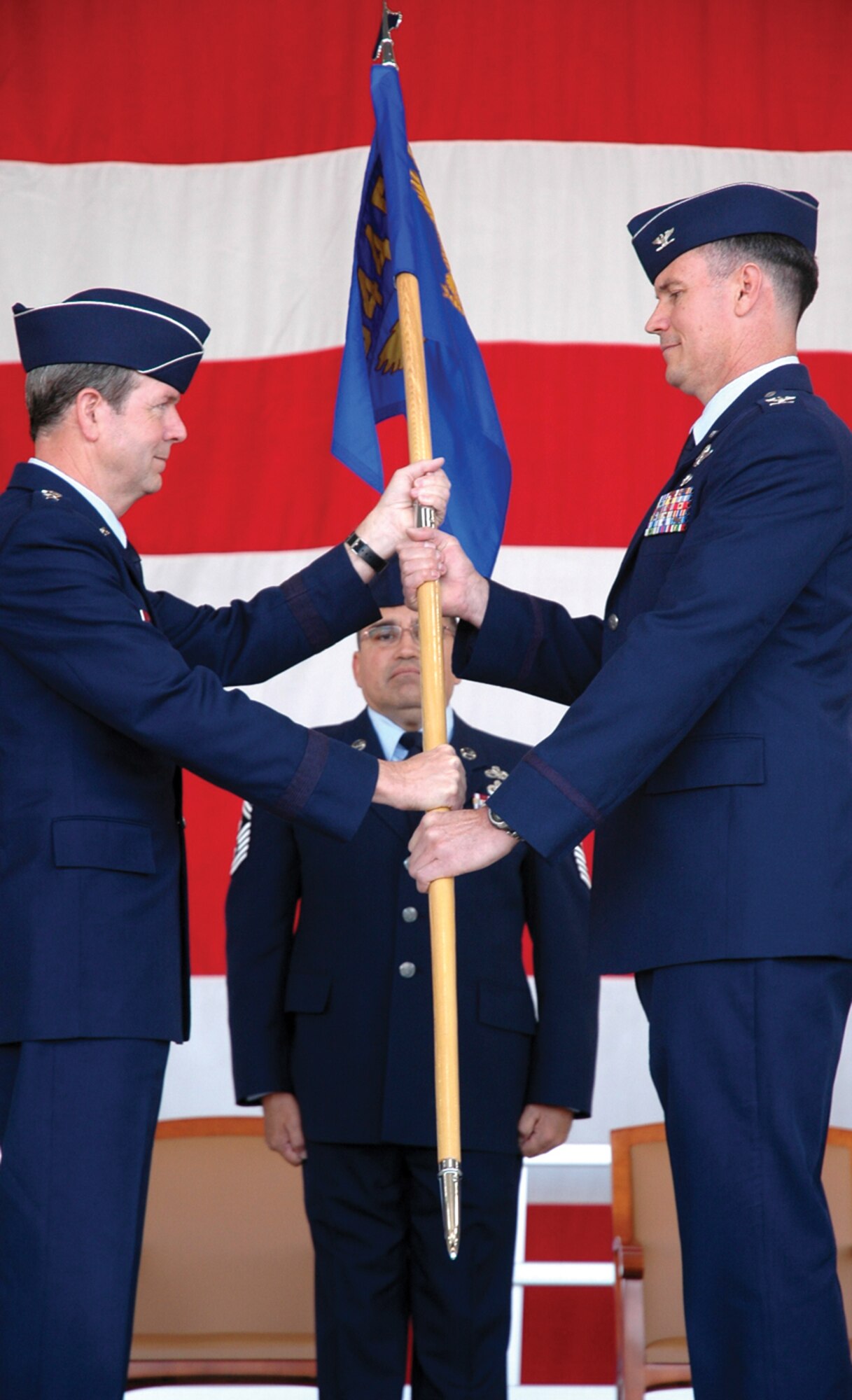 Col. Michael Popovich accepts command of the 944th Fighter Wing from Maj. Gen. Thomas Coon, 10th Air Force commander, Saturday.  (U.S. Air Force photo/Tech. Sgt. Susan Stout)