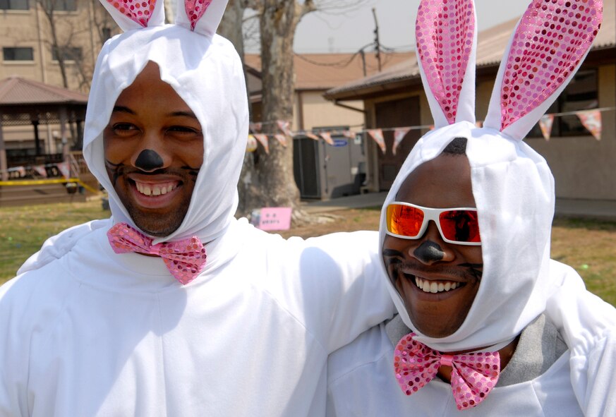 Senior Airman Travis Morehead (left) and Senior Airman Jonathan Johnson dress as bunnies to entertain the children at the Osan Air Base Egg Hunt, April 11.  Hundreds of children and parents took part in the event, which coincided with Easter weekend.  April is designated by the Department of Defense as "The Month of the Military Child" and is also National Child Abuse Prevention Month. (U.S. Air Force photo/Staff Sgt. Brian Ferguson) (U.S. Air Force photo/Staff Sgt. Brian Ferguson)
