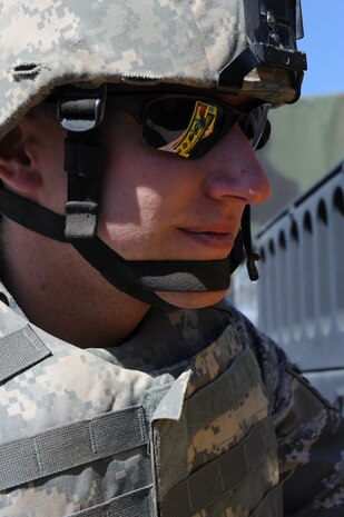 Staff Sgt. Brian Dube, an explosive ordnance disposal (EOD) journeyman with the 99th Civil Engineer Squadron, manually operates the controls for a total containment vessel (TCV) during a simulated deployed scenario, April 9, Nellis Air Force Base, Nev. EOD personnel use the TCV to contain blasts from various explosive devices. 
(U.S. Air Force photo by/Senior Airman Nadine Y. Barclay/RELEASED)