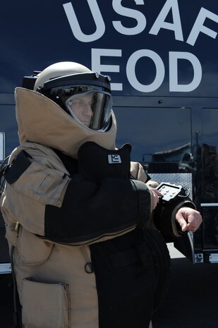 Airman 1st Class Joshua Hanna,an explosive ordnance disposal (EOD) journeyman with the 99th Civil Engineer Squadron, adjusts the oxygen levels while in a bomb suit, April 9, Nellis Air Force Base, Nev. The bomb suit is a part of an EOD personal protective equipment, designed to essentially absorb a blast and increase survivability. (U.S. Air Force photo by Senior Airman Nadine Y. Barclay/RELEASED)