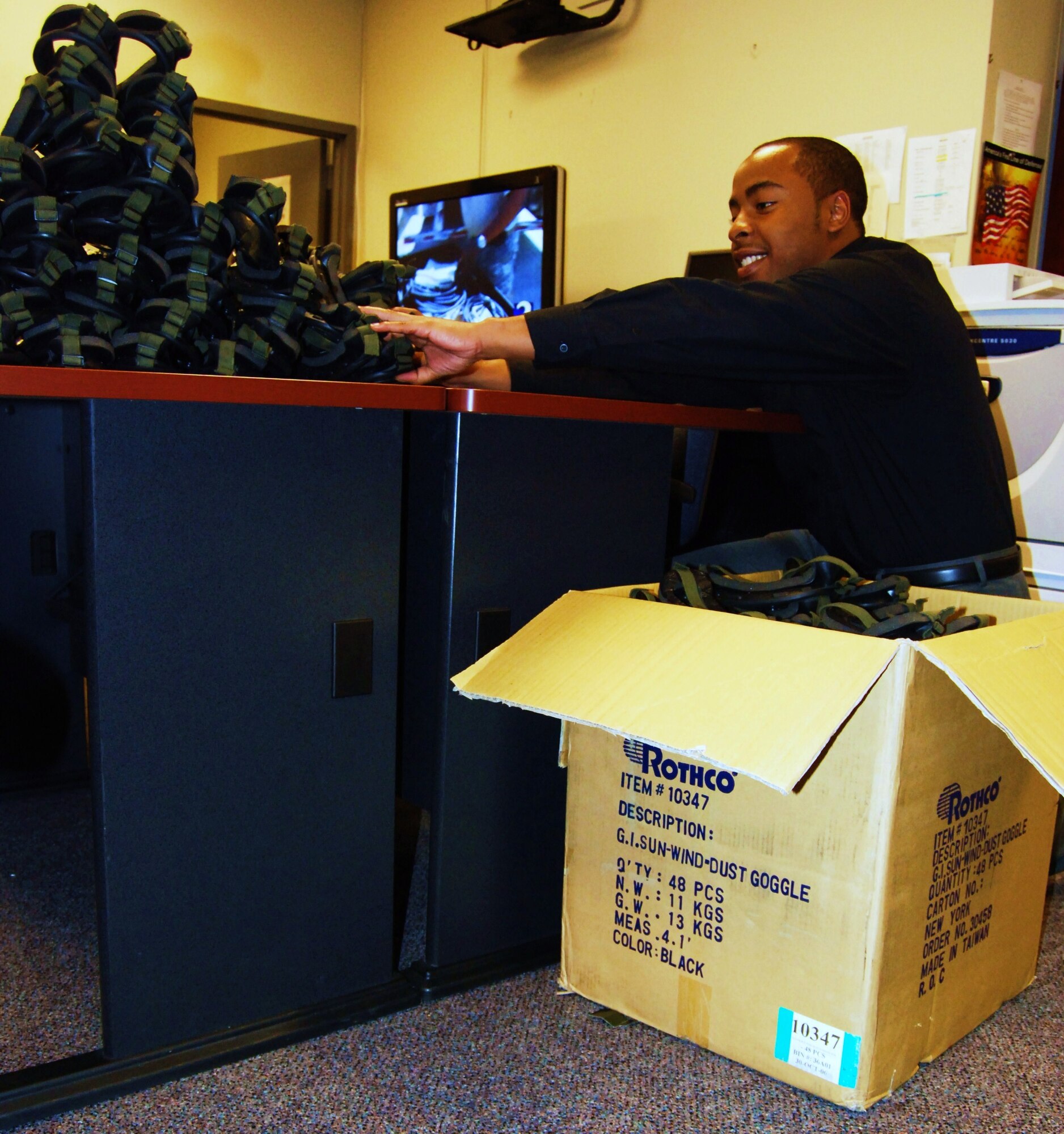 DOBBINS AIR RESERVE BASE, Ga. -- As part of the Student Temporary Employment Program, Kennith Green, currently a full-time student at Georgia State University, assists the 94th Public Affairs office here April 13 in preparation of the arrival of Junior Reserve Officers Training Corps cadets for a tour of the base April 14-15. Mr. Green is among 18 other students that are currently participating in the STEP program here. (U.S. Air Force Photo/Airman Chelsea Gitzen) 