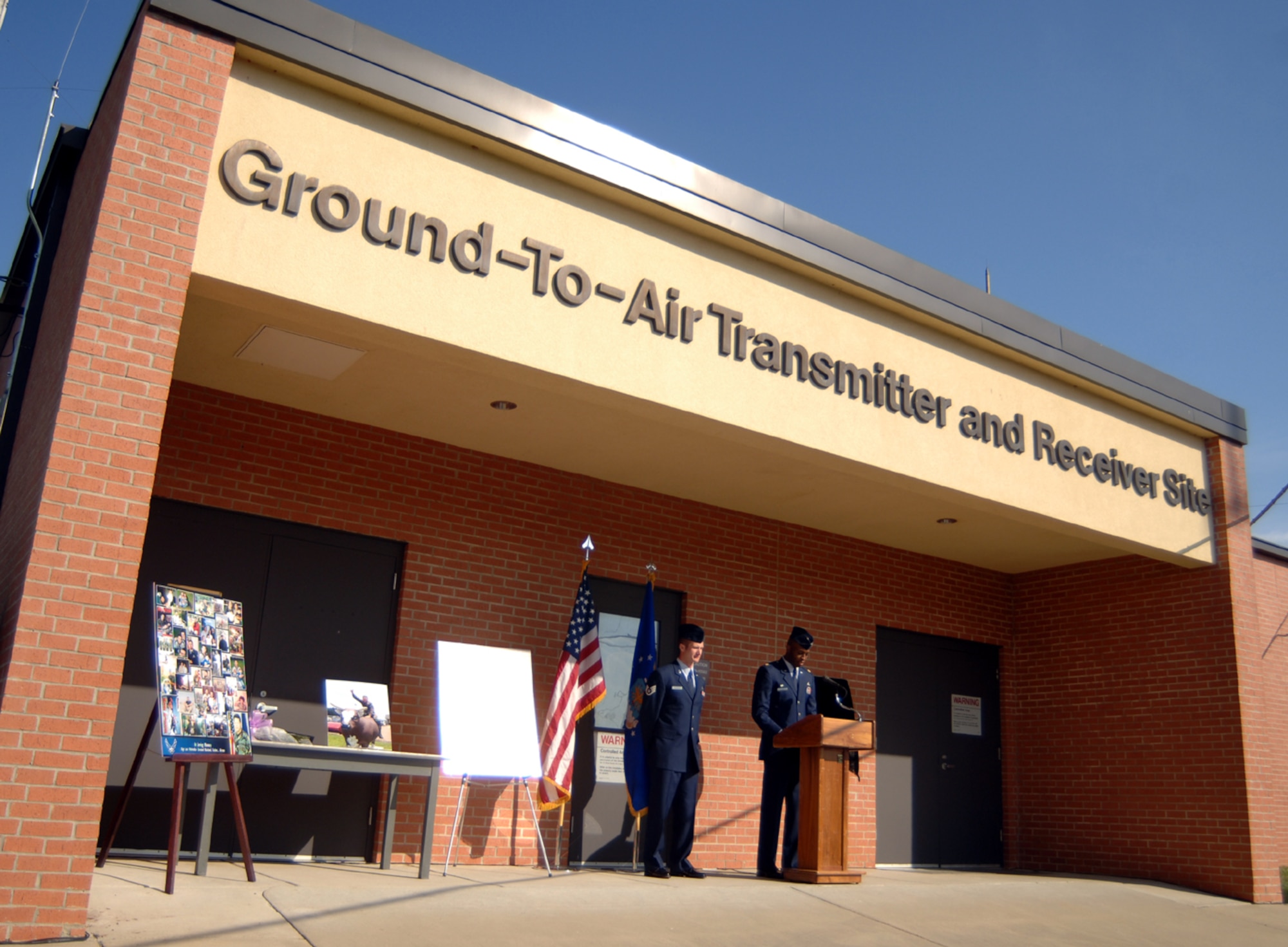 Maj. Leo Lawson, 14th Communications Squadron commander, speaks at the dedication of the Ground-to-Air Transmitter and Receiver Site to Staff Sgt. Luiz Melendez. Sergeant Melendez was a former 14th CS member who was killed in a helicopter crash in support of Operation Enduring Freedom in February 2006. (U.S. Air Force photo/Senior AIrman Jacob Corbin).