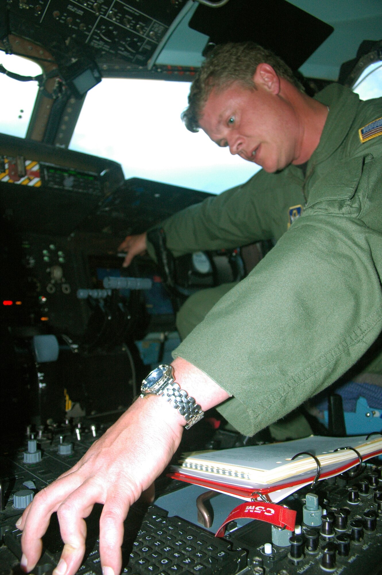 Master Sgt. Lawrence Roy, 512th Airlift Wing flight engineer and C-5M aircrew member, conducts the preflight check for the Super Galaxy before returning to Dover Air Force Base, Del., from Ramstein Air Base, Germany April 8. The aircrew was composed of Dover AFB active duty and Reserve Airmen and Lockheed Martin field service representatives. The 13-day training mission was part of the on-going familiarization period for the Air Force's newest airlifter. (U.S. Air Force photo/Senior Airman Andria J. Allmond)