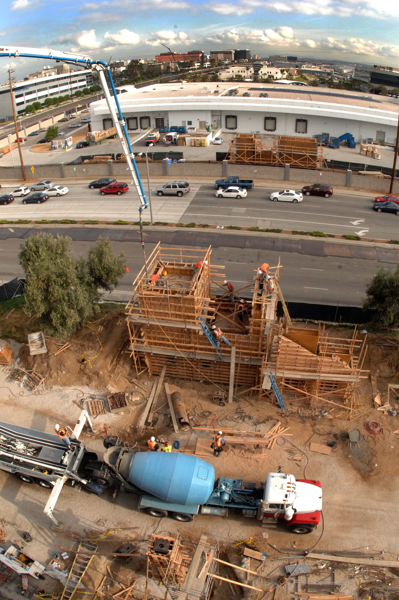 Work continues on the pedestrian bridge that will link Los Angeles Air Force Base with The Aerospace Corporation’s office area.  The bridge, spanning El Segundo Boulevard, is expected to be complete in September.  (Photo by Mike Morales, The Aerospace Corporation)