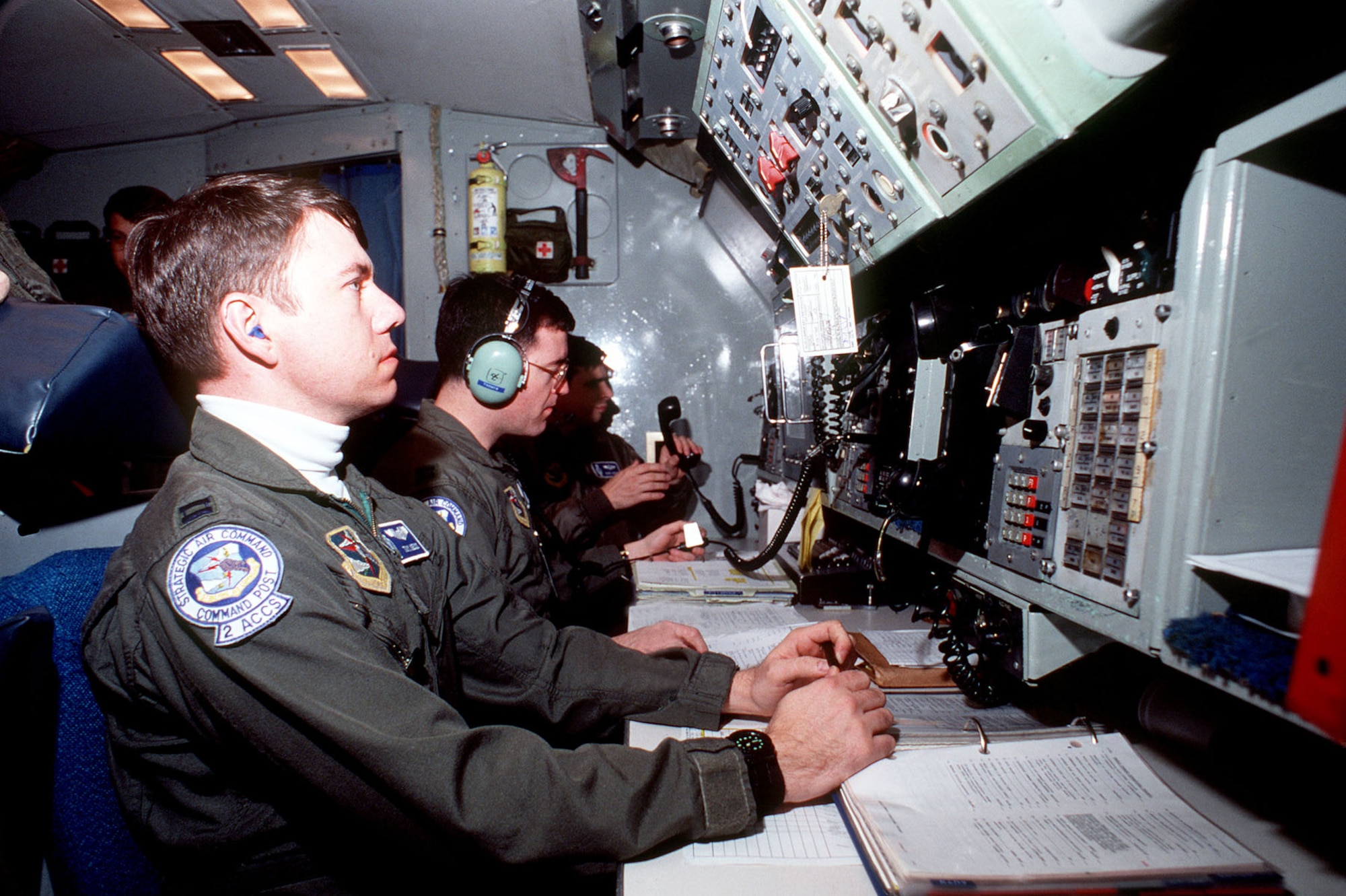 Minuteman III missiles can be launched from an airborne command post if ground command centers are disabled. Here, a “Looking Glass” airborne command post crew prepares a test launch in 1991. (U.S. Air Force photo)