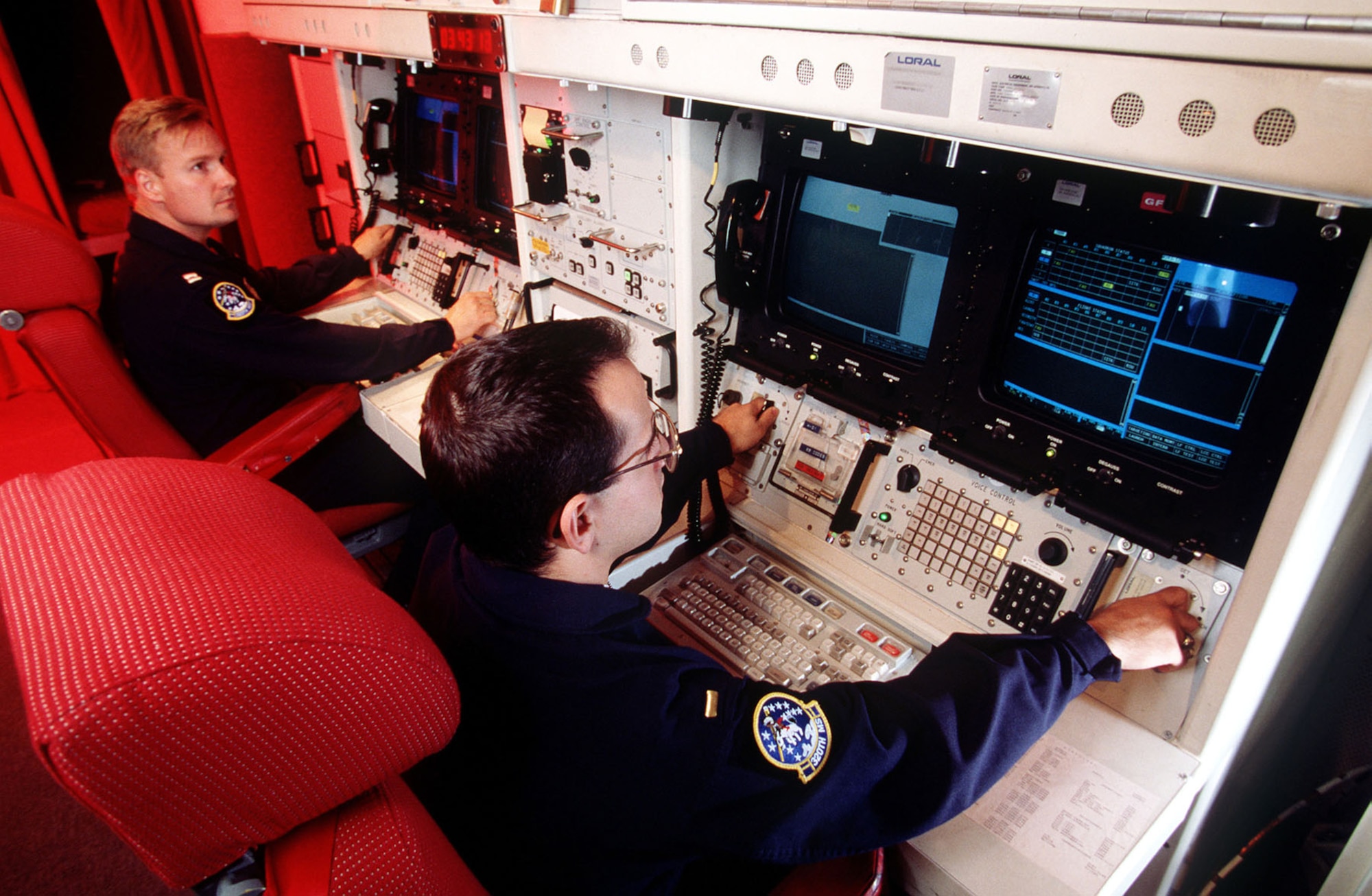 A combat crew simulates a Minuteman III launch at F.E. Warren AFB, Wyo. Their launch console is a REACT, or “Rapid Execution and Combat Targeting,” console. It is faster than older systems, but still requires two crewmen to operate -- a single person cannot launch a missile. (U.S. Air Force photo)