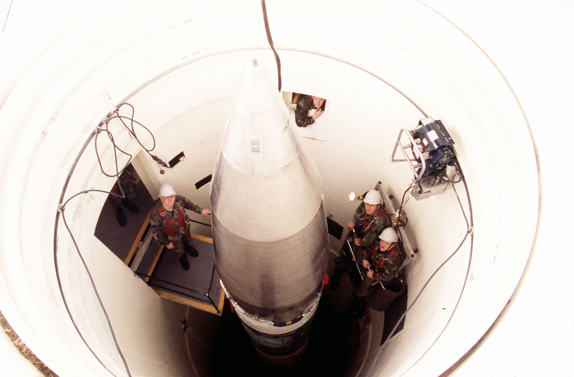 Missile maintainers with a Minuteman III at F.E. Warren AFB, Wyo. (U.S. Air Force photo)