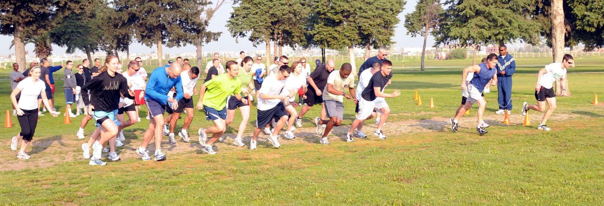 Runners take off to start the Sexual Assault Awareness Month cross country relay race Saturday, April 11, 2009, at the Hodja Lakes Golf Course. The race was three, 1.3 mile-long legs to enjoy the Incirlik scenery and get information about the Sexual Assault Prevention and Response program. (U.S. Air Force photo/Senior Airman Heather Stanton)
