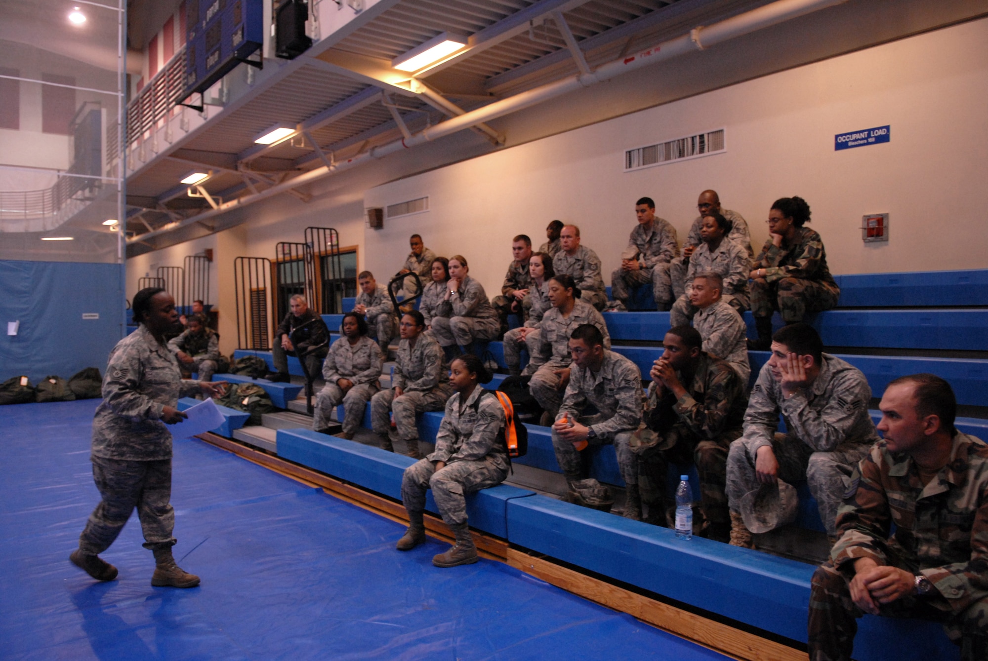 Technical Sgt. Tonia Jean-Pierre, 8th Medical Group, trains Airmen from the 8th Fighter Wing on nerve agent antidote injectors as part of Wolf War Day at Kunsan Air Base, Republic of Korea, April 13, 2009. Wolf War Day was a base-wide refresher for Self Aid and Buddy Care, and Ability To Survive and Operate in preparation for the upcoming Operational Readiness Inspection.  