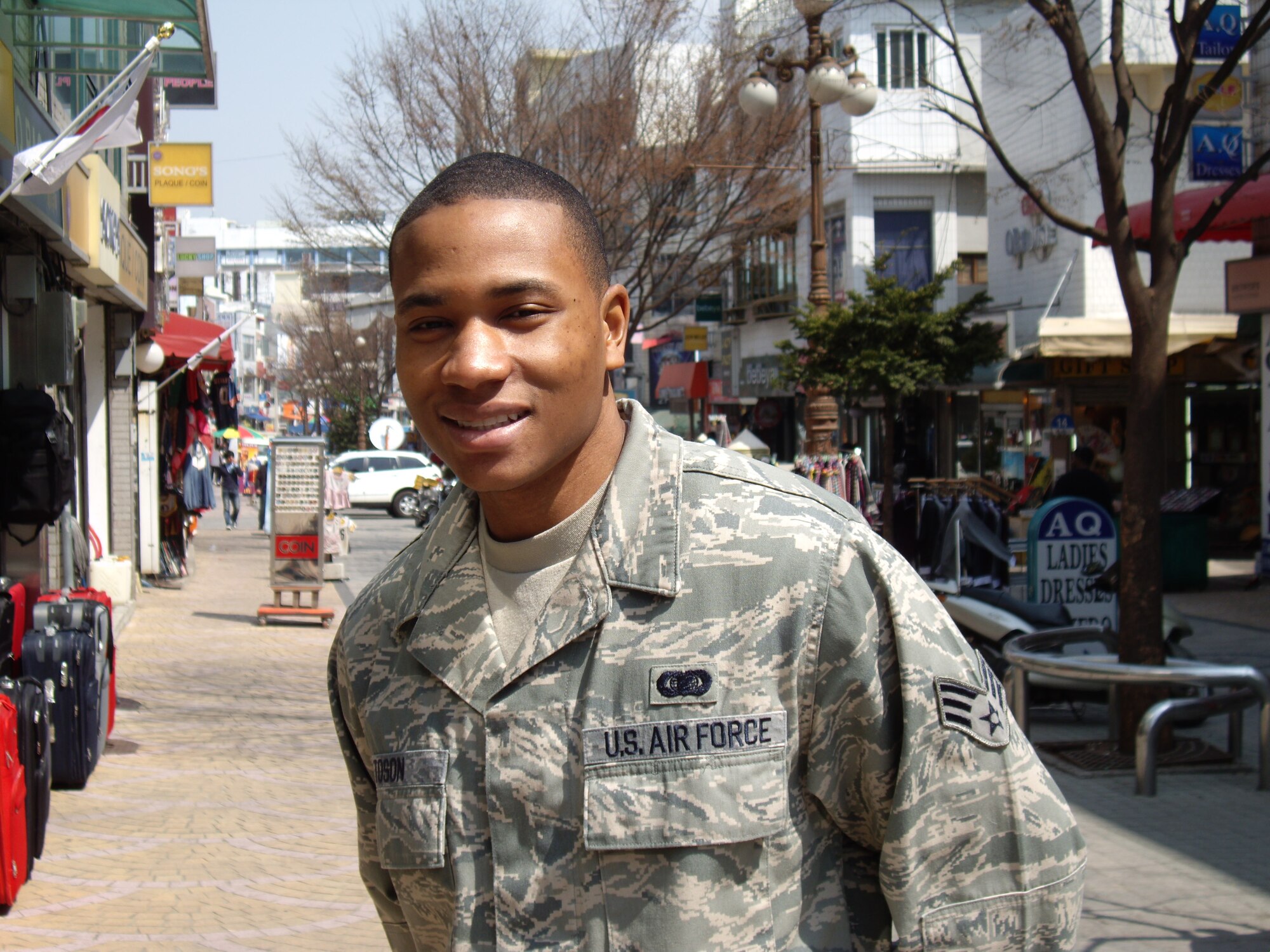 Senior Airman Antwon Toson won "Airman of the Year" for both Pacific Command
and Air Force Element (AFELM). At age 23 and assigned to Headquarters Air
Component Command in Korea, this means he's being recognized as the number
one enlisted airman of all members in the rank of Airman Basic, Airman,
Airman First Class and Senior Airman in the largest theater in the U.S. Air
Force. (Photo by Lt. Col. René White)  
