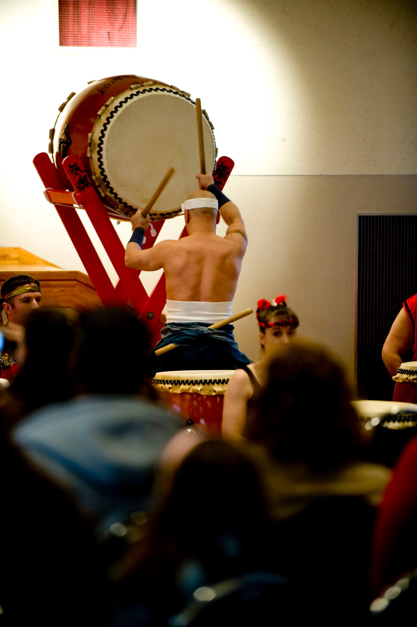 MISAWA AIR BASE, Japan -- Kiyotaka Hosoi, master taiko player and mentor to the Dragon-Eagle Taiko team, plays an odaiko solo at the Mokuteki Community Center March 28, 2009. His solo kicked off the tenth annual performance by the team. (U.S. Air Force photo by Staff Sgt. Samuel Morse)