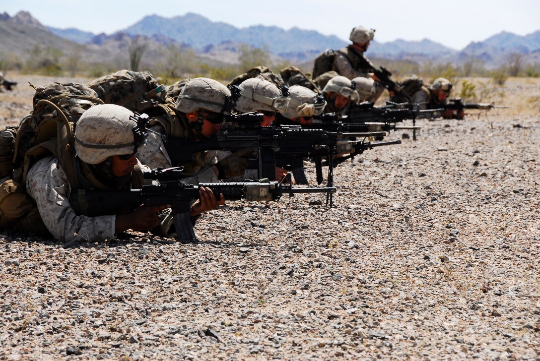 Marines with the 3rd Battalion, 9th Marine Regiment, set up a perimeter around a landing zone on an Army Yuma Proving Ground range in Yuma, Ariz., during an air assault exercise April 13, 2009. The battalion is training for its deployment in August 2009. The Camp Lejeune, N.C., battalion is scheduled to conclude their training in Yuma with a battalion-sized helicopter-borne assault exercise in late April, the largest exercise of its type conducted in approximately 10 years.